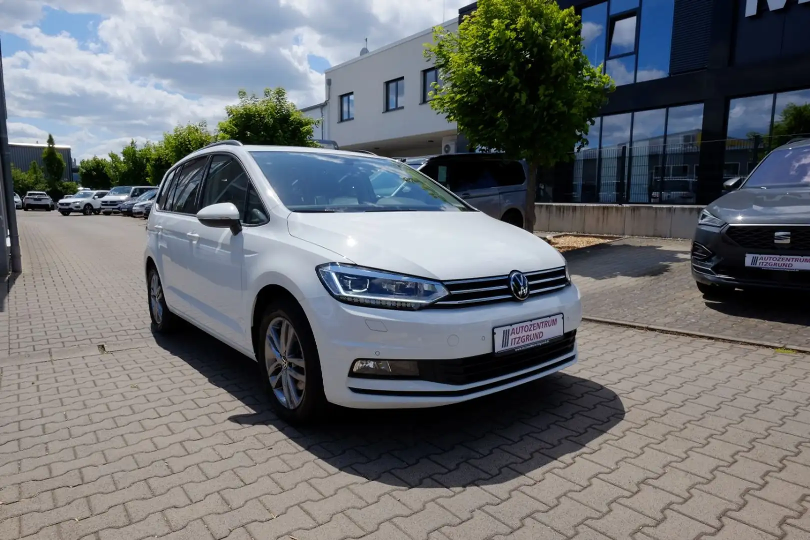 Volkswagen Touran 4ALL 1.5 TSI DSG Pano/Navi/Kame/7-S/17Z Blanc - 1