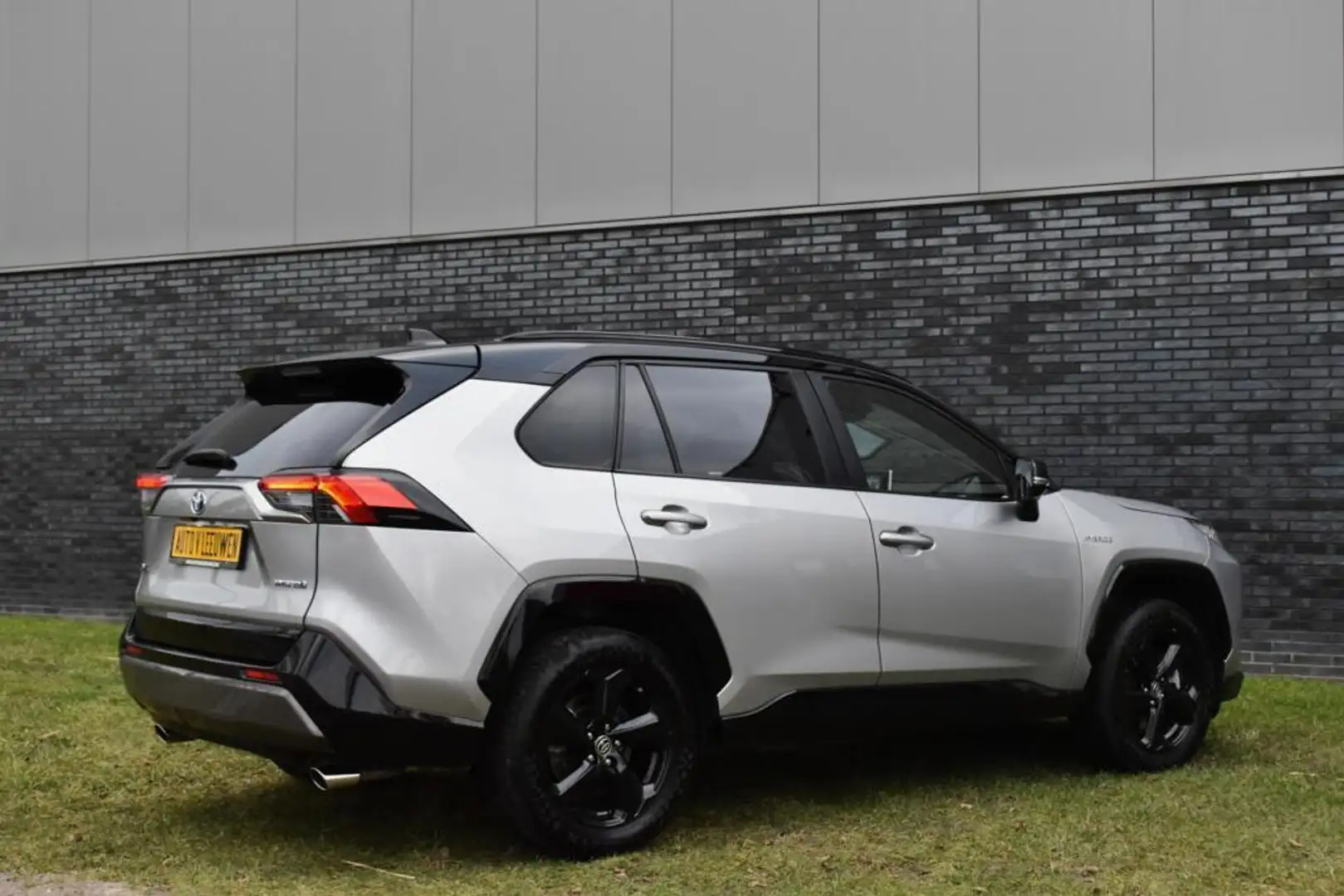 Toyota RAV 4 2.5 Hybrid AWD Bi-Tone JBL/CAMERA/NAVI/ACC/ELEK. A Grijs - 2