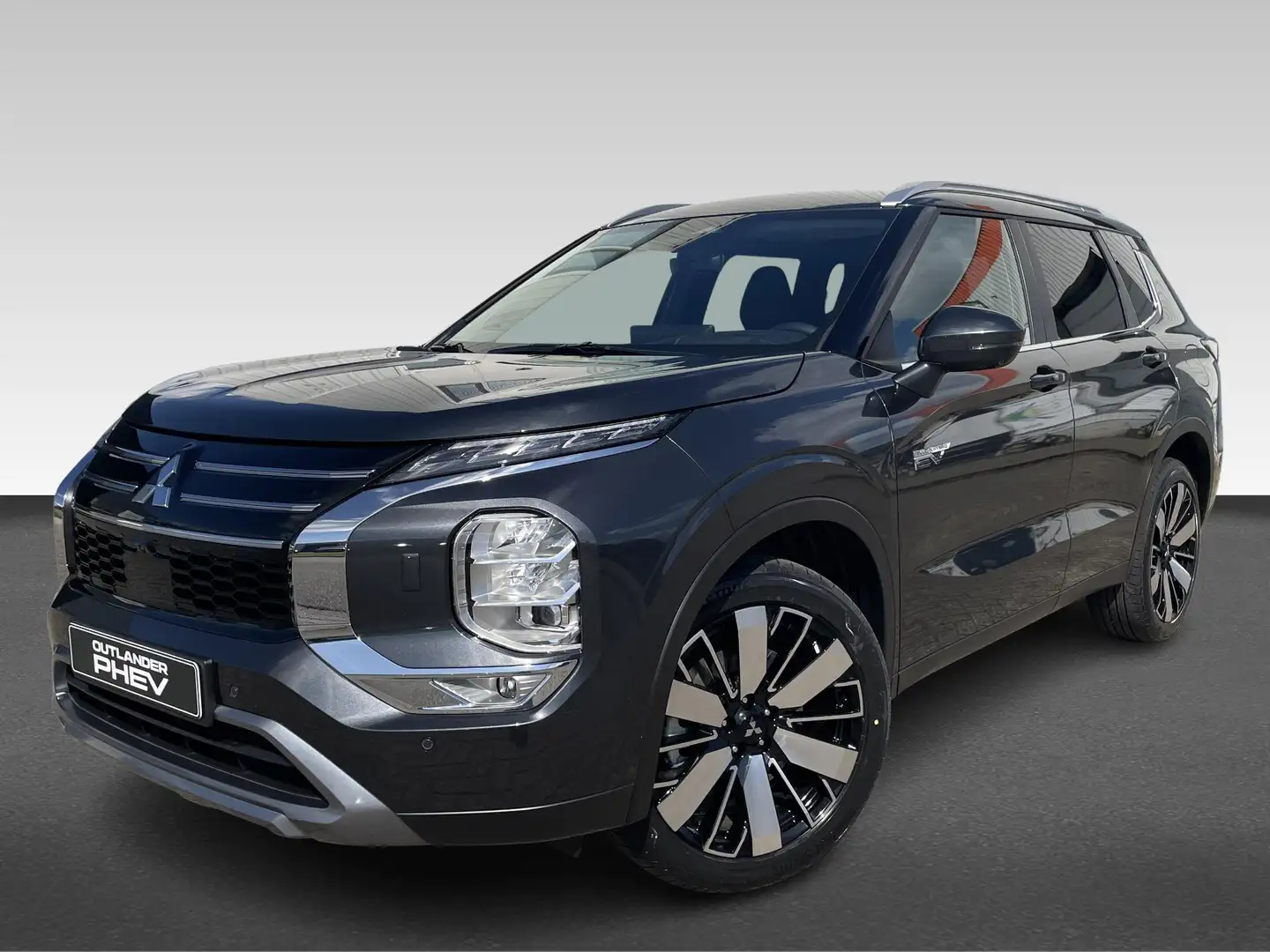 Mitsubishi Outlander 2.4 PHEV First Edition Van € 58.045,- voor € 55.93 Grau - 1