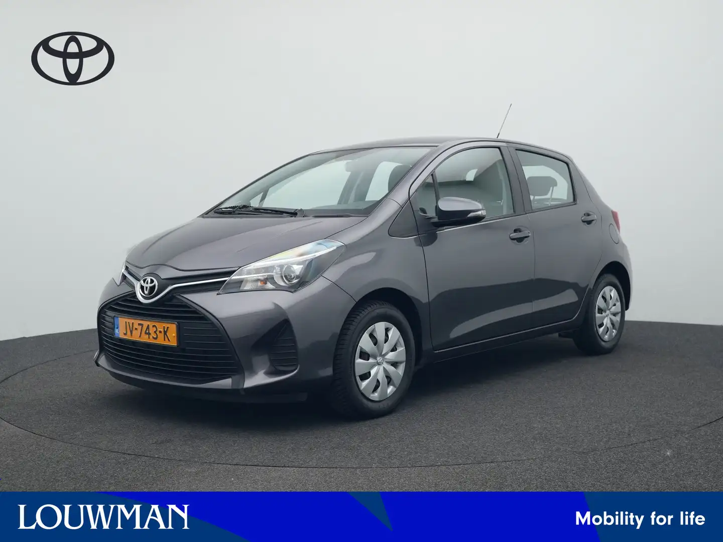 Toyota Yaris 1.3 VVT-i Now Grijs - 1