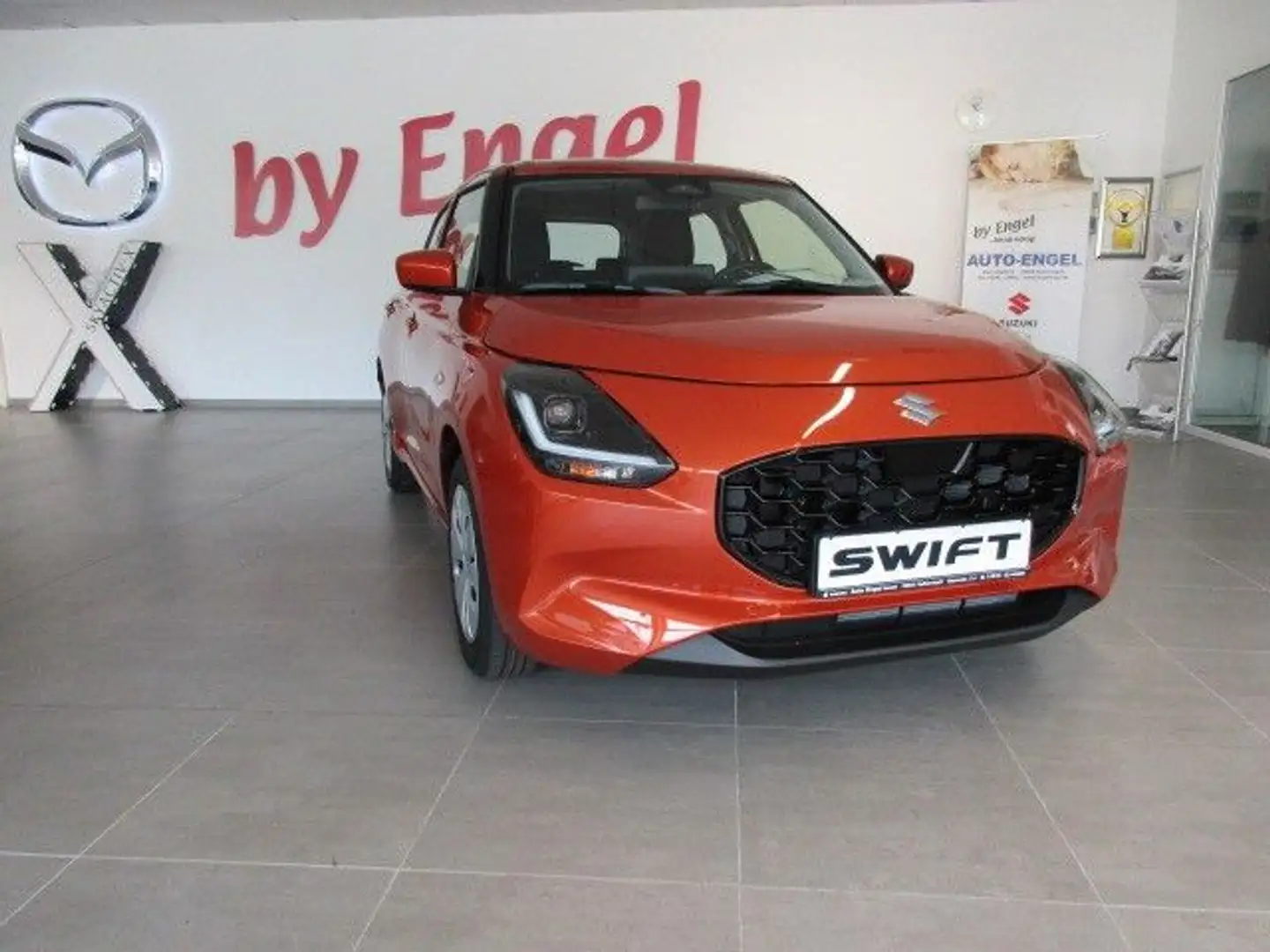 Suzuki Swift 1.2 HYBRID Club sofort Oranje - 1