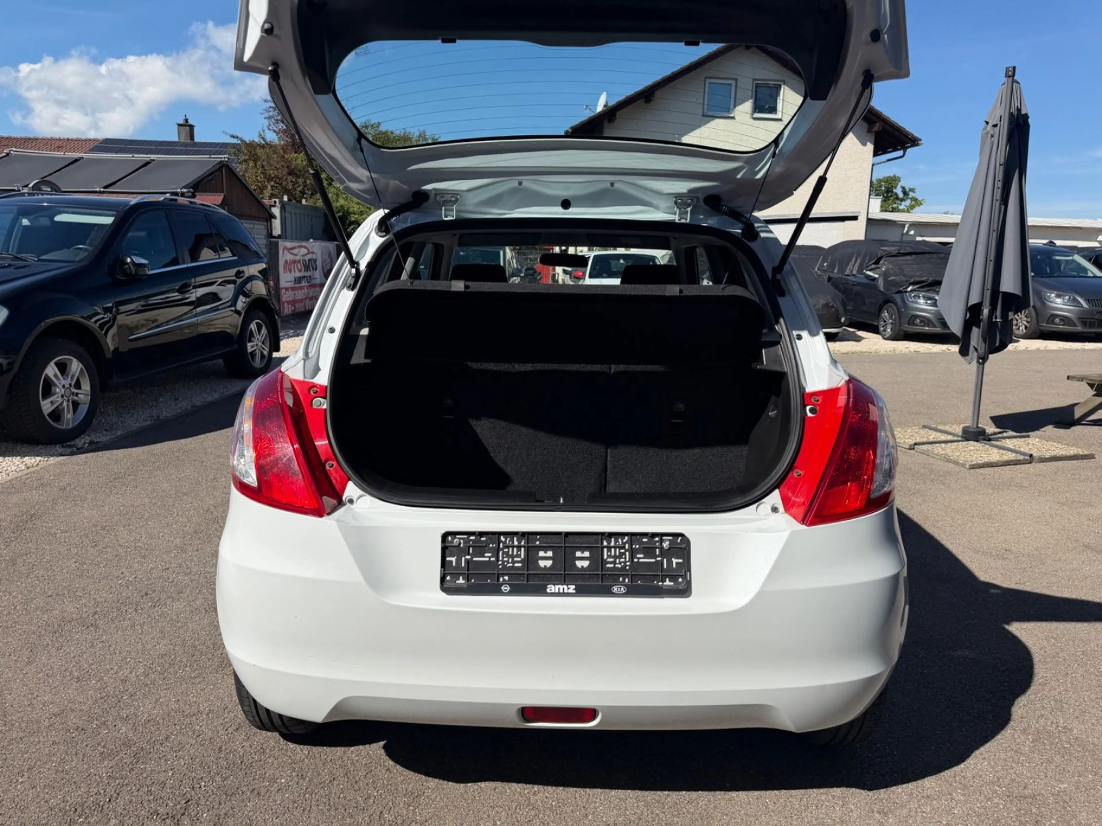 Suzuki Swift Club 4x4 KLIMAAUTOMATIK/SHZ/3.Hd — photo 12
