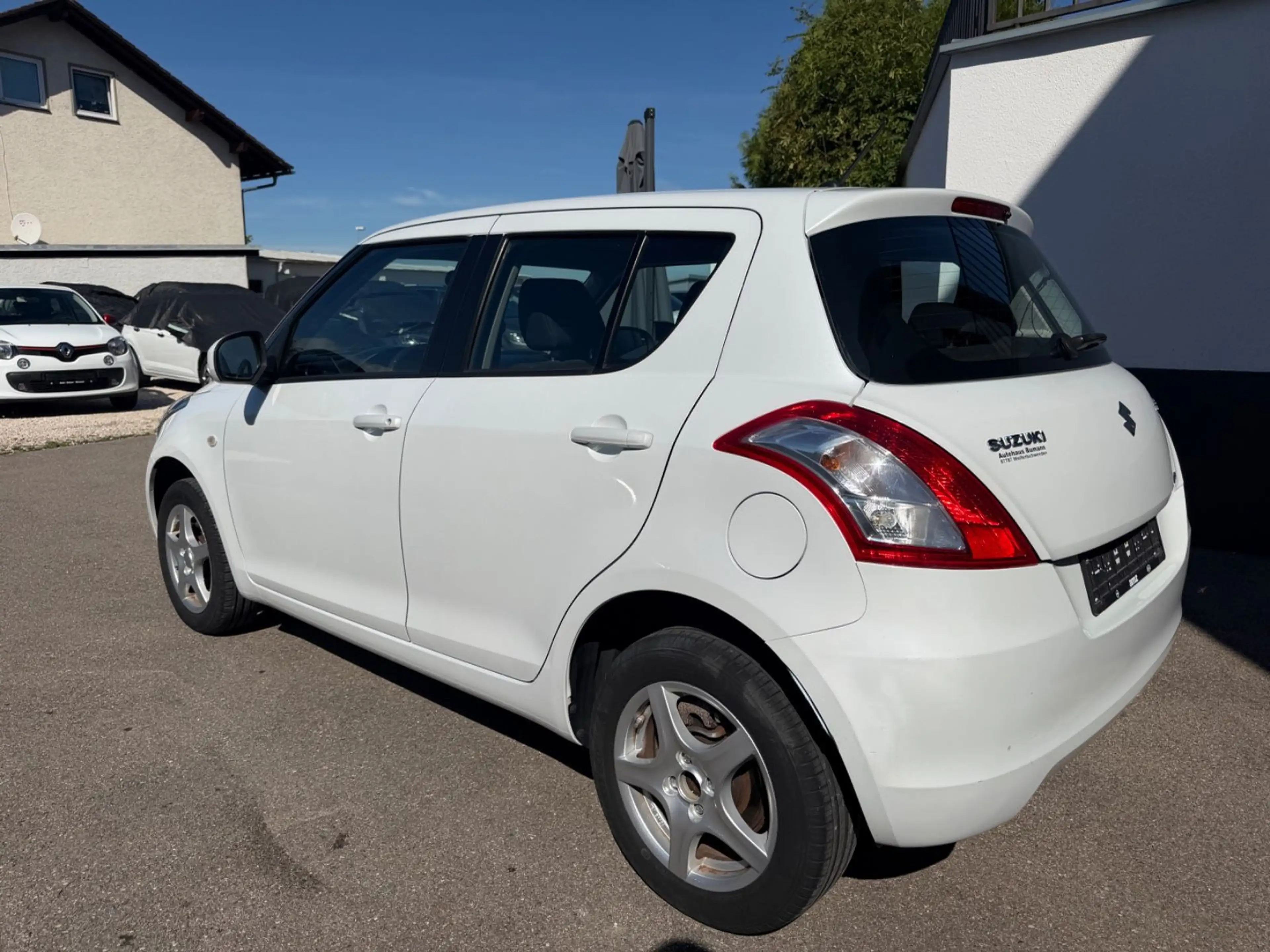 Suzuki Swift Club 4x4 KLIMAAUTOMATIK/SHZ/3.Hd — photo 4