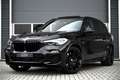BMW X5 xDrive45e M-SPORT / PANO / LUCHTVERING / MEMORY / Zwart - thumbnail 1
