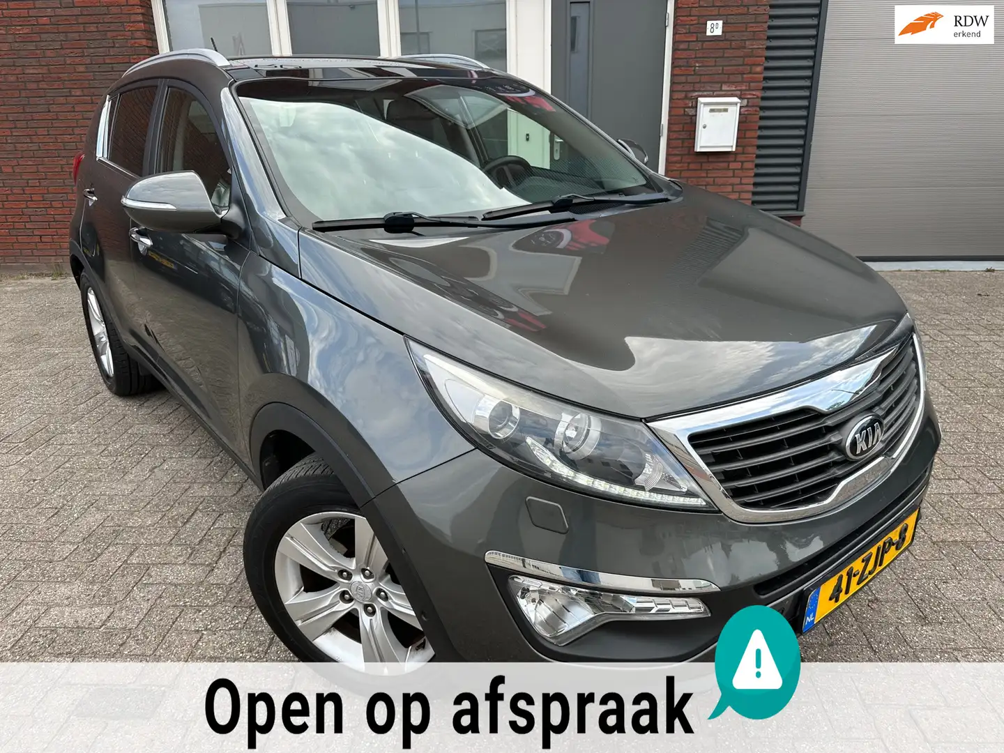 Kia Sportage 1.6 GDI Super Pack / Pano / Leder / Camera / Navi Grijs - 1