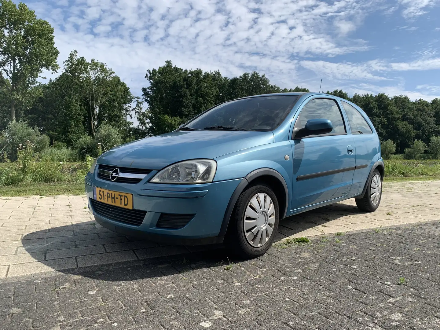 Opel Corsa 1.0-12V Enjoy Azul - 1