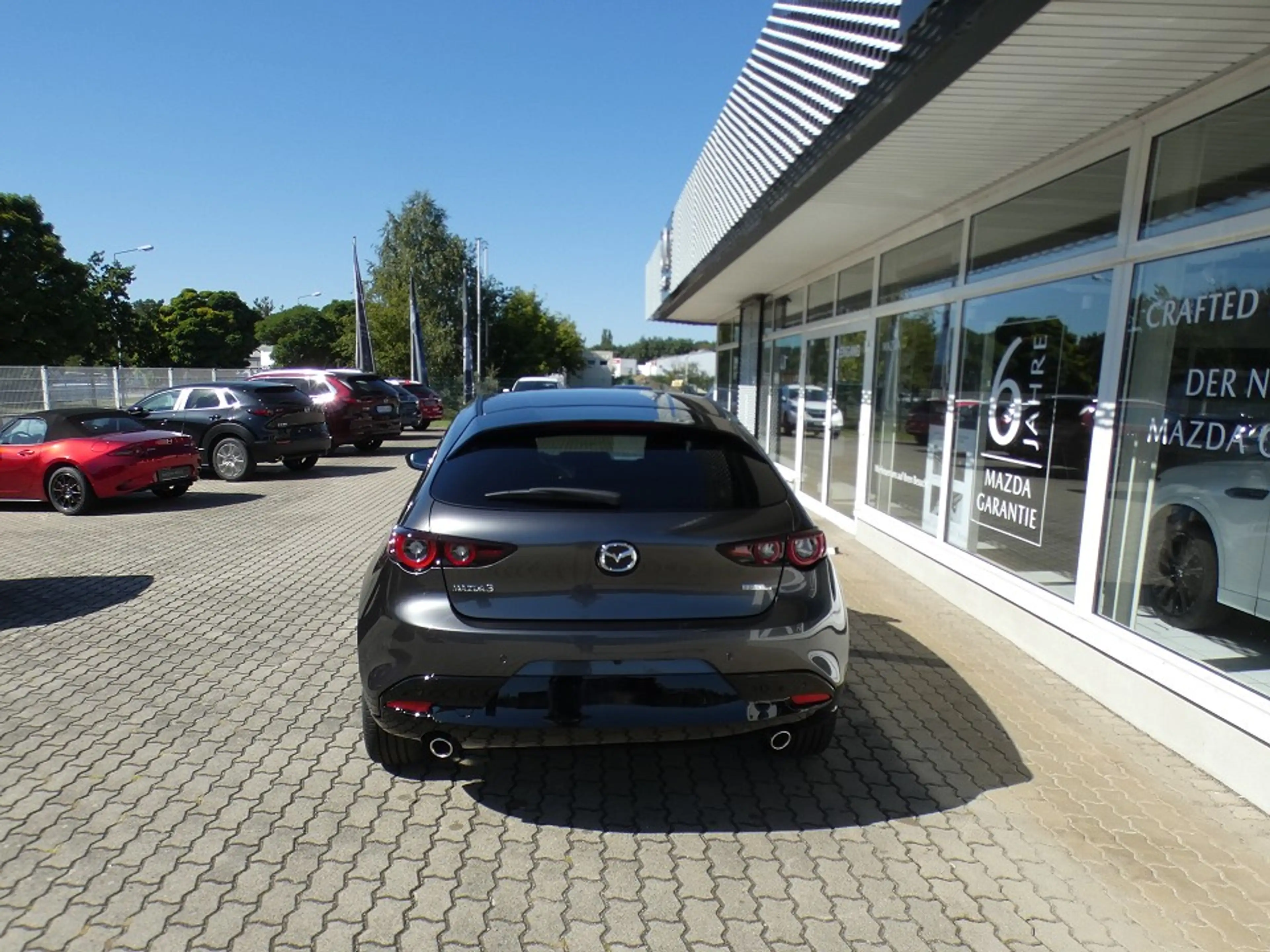 Mazda 3 2.5L e-SKYACTIV G 140ps 6MT FWD Homura — photo 6