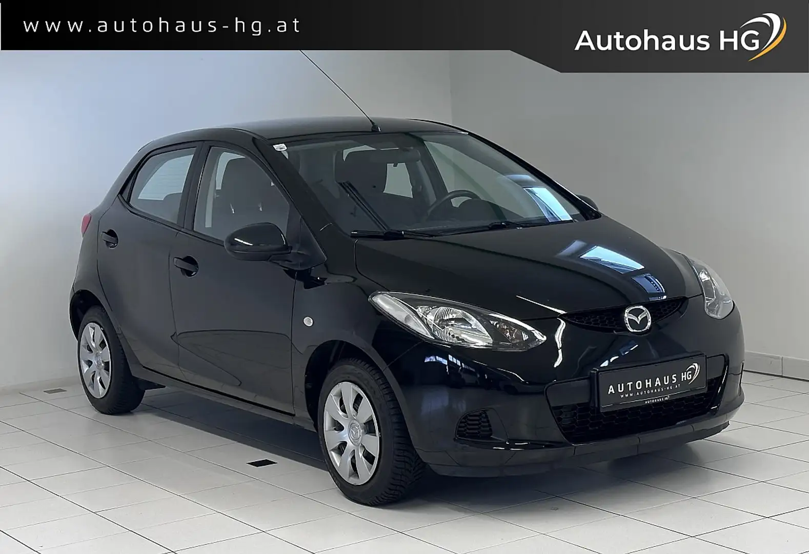Mazda 2 Mazda2 1,3i CE Plus Schwarz - 1