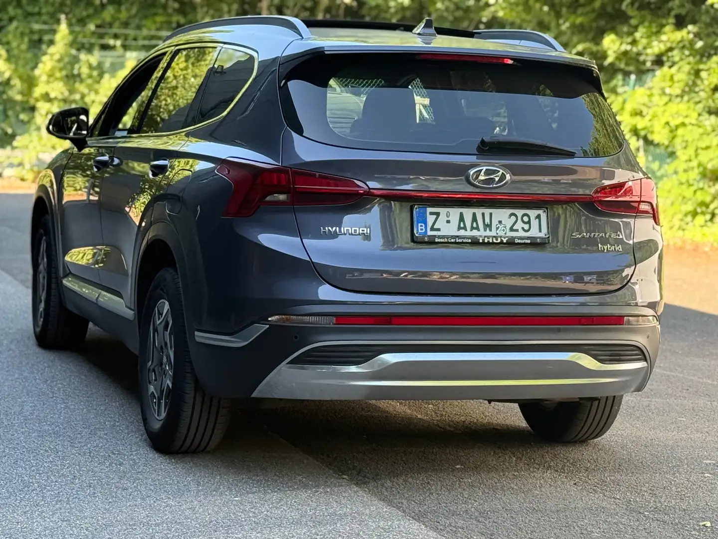 Hyundai SANTA FE 1.6 Hybride 7pl -2021-69000km-Pano-Led-Cam-Garant Grijs - 2