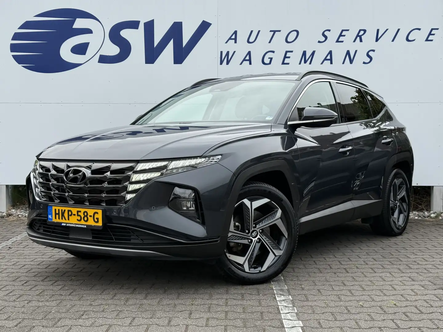 Hyundai TUCSON 1.6 T-GDI PHEV Comfort Smart 4WD | Trekhaak | CarP Grijs - 1