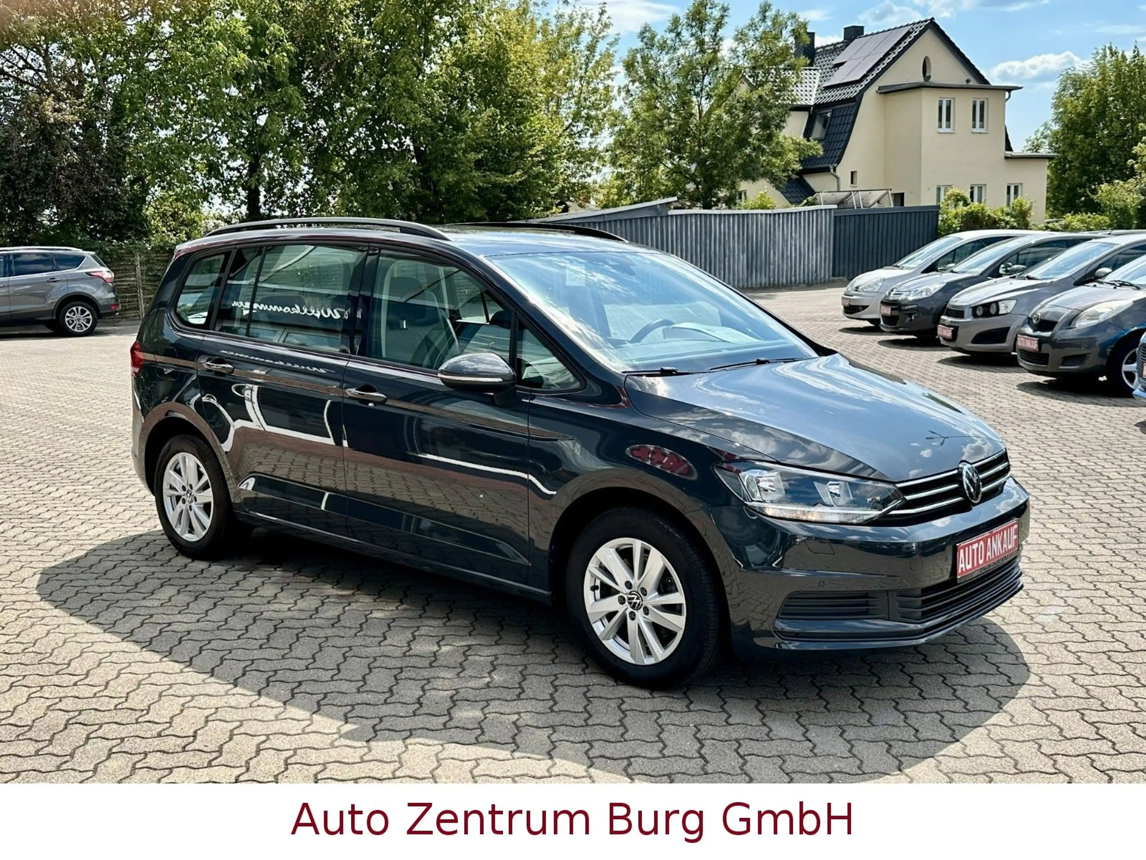 Volkswagen Touran Comfortline BMT DSG Navi AHK — photo 4
