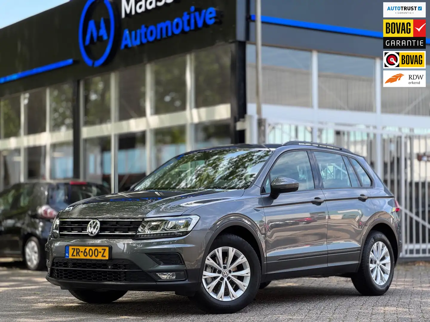 Volkswagen Tiguan 1.4 TSI ACT Aut Lane ass Volledig onderhouden Navi Grijs - 1