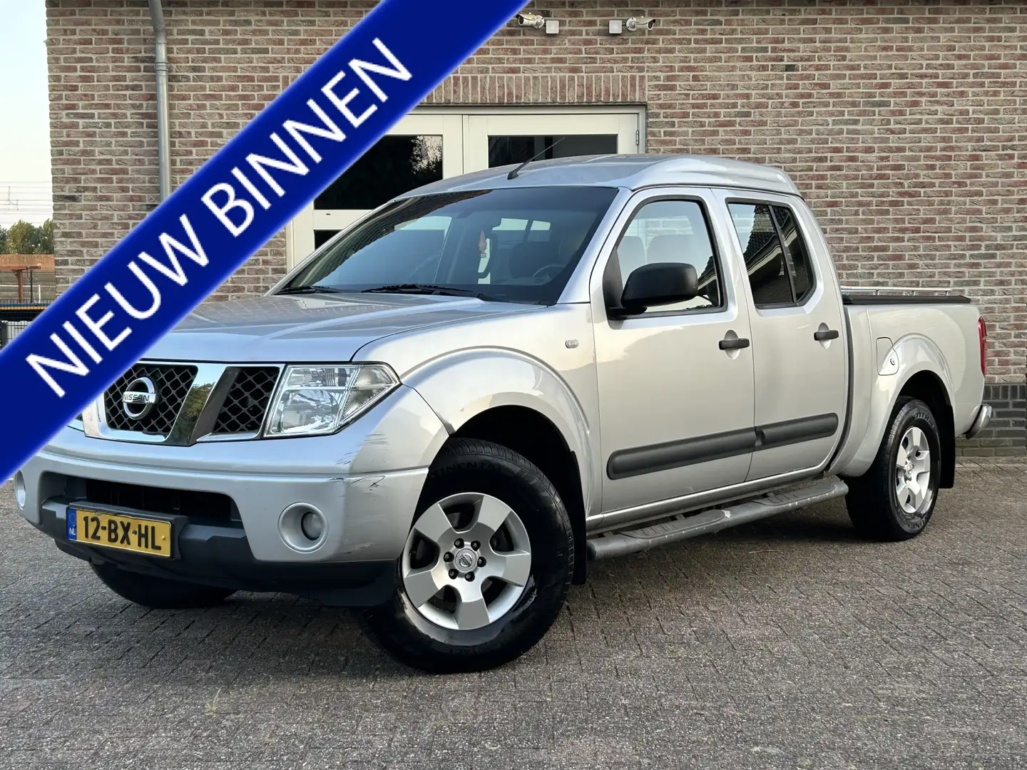 Nissan Navara 2.5 dCi SE Double C. Airco 4x4 Argento - 1