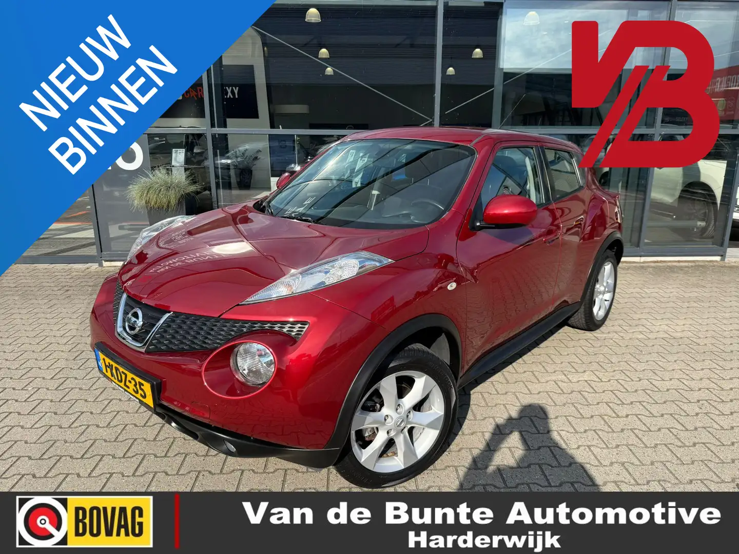 Nissan Juke 1.6 Acenta *Apple Carplay & Android Auto* Rood - 1