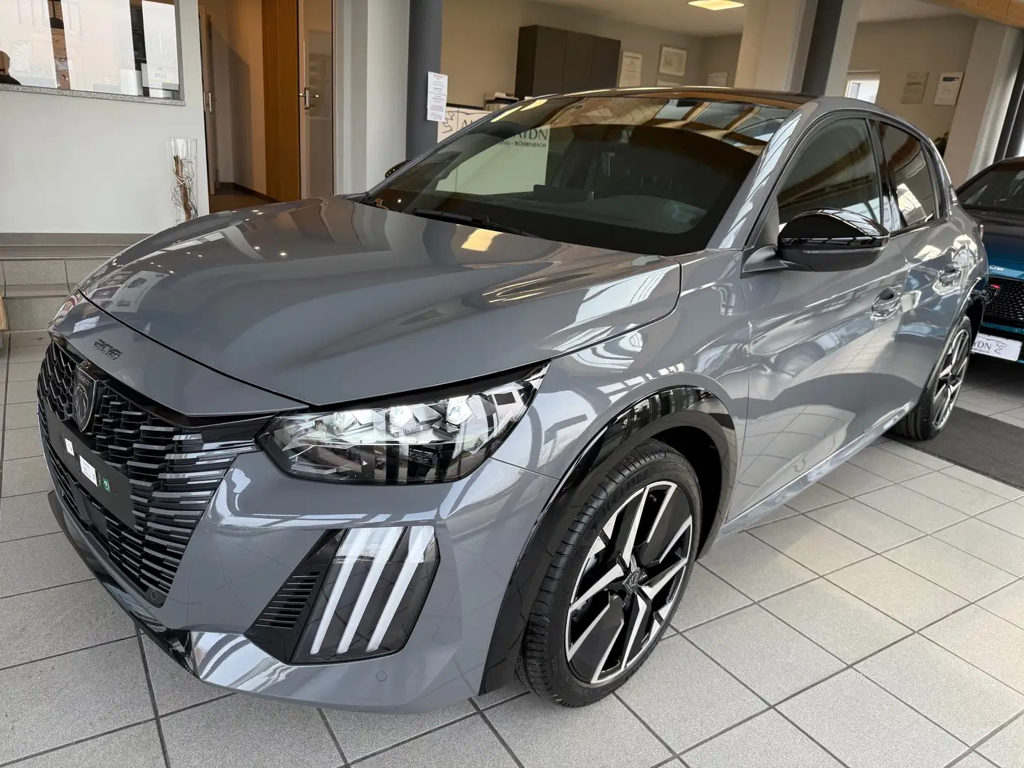 Peugeot 208 Hybrid 145 GT e-DSC6,Szhg, Kamera,ACC,LED,CarPlay Grijs - 1