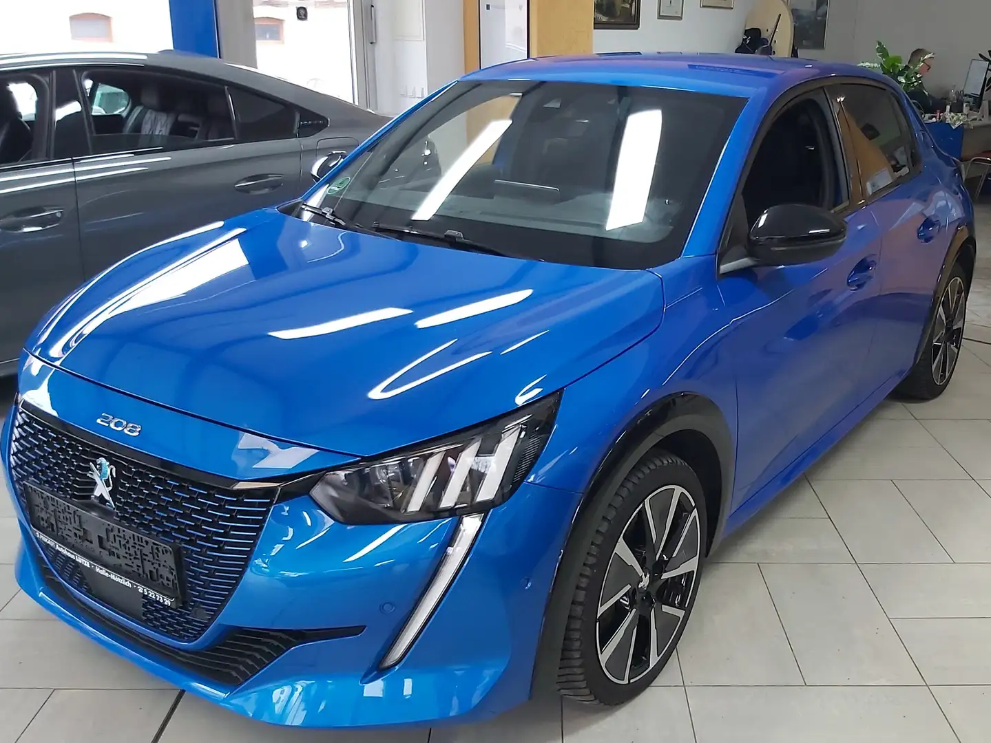 Peugeot 208 e-GT Allwetter-ALU ,SHZ, Navi ,wenig Kilometer, Bleu - 1