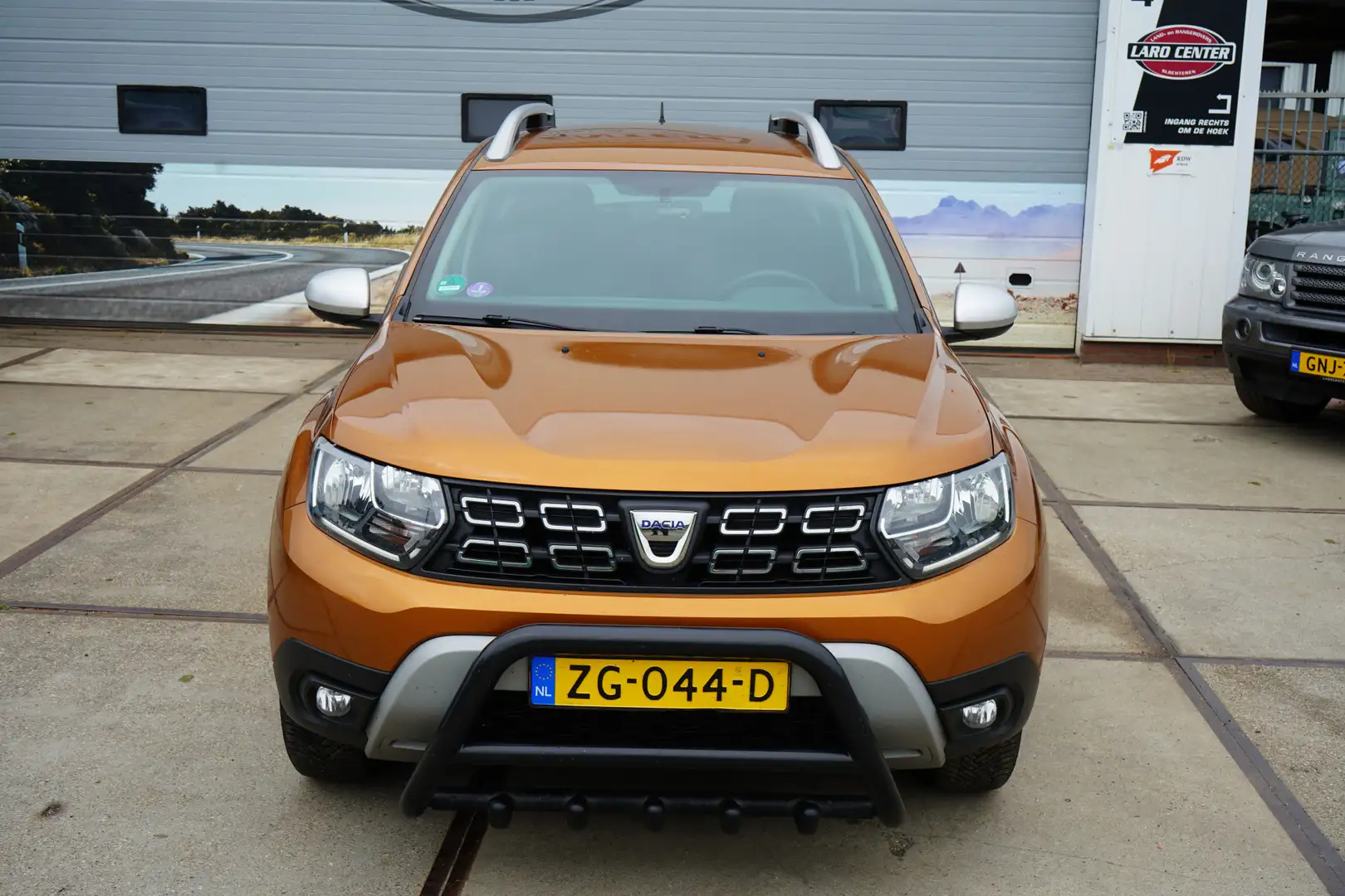 Dacia Duster 1.3 TCe Prestige 150 pk motor Naranja - 2