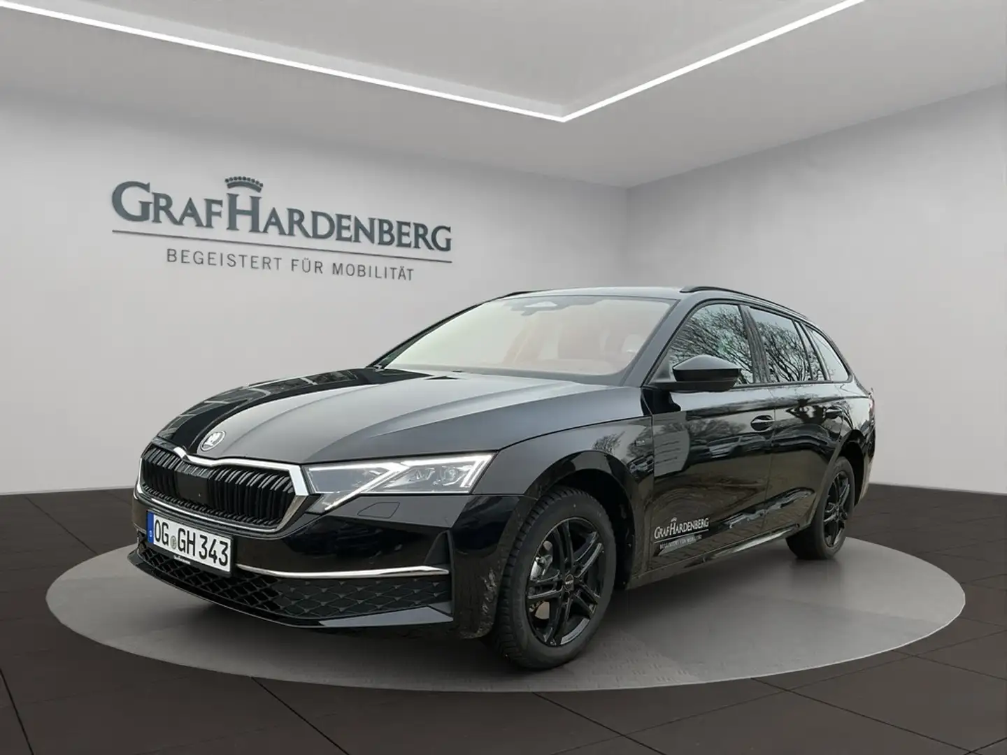 Skoda Octavia Combi Tour 2,0 TDI 110 kW 7-Gang Schwarz - 1