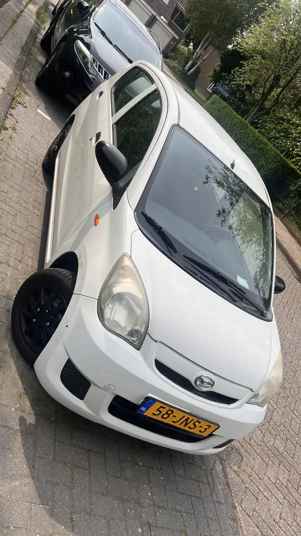 Daihatsu Cuore 1.0 Clever Bianco - 1