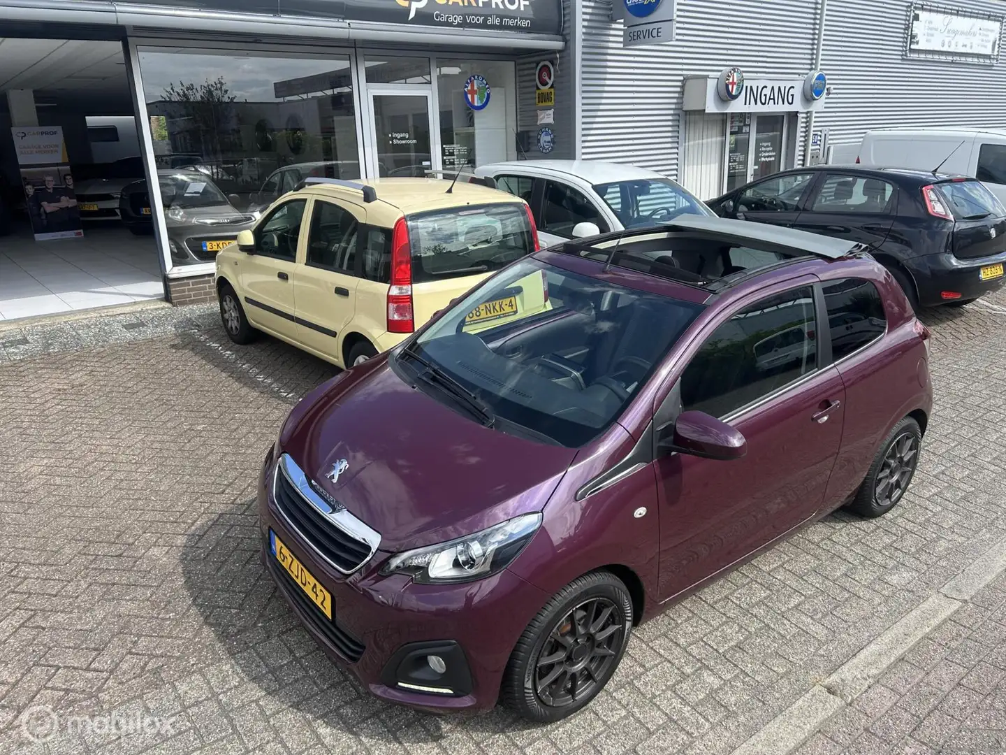 Peugeot 108 Cabrio top 1.0 e-VTi Carplay Navigatie Paars - 1