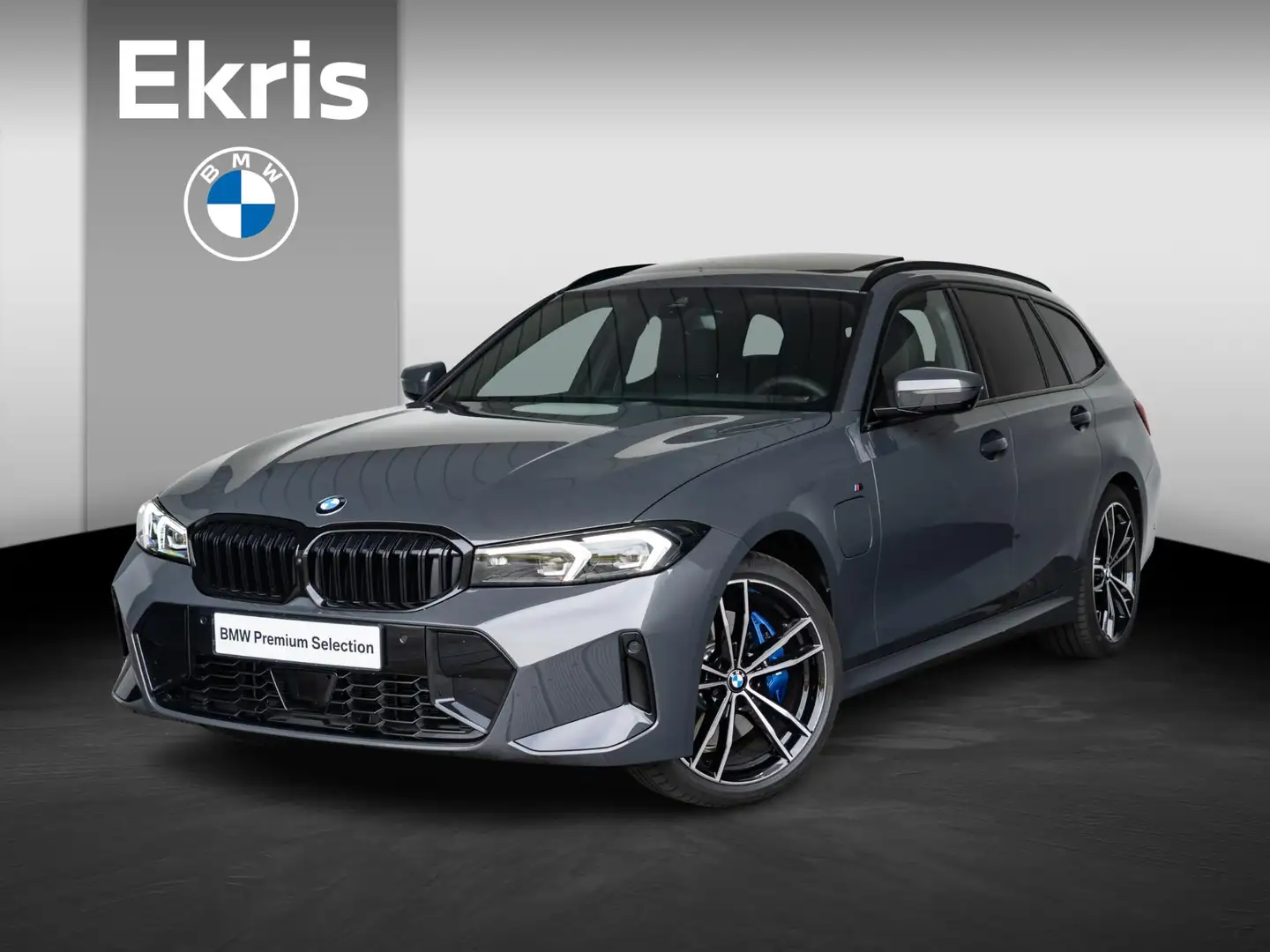 BMW 330 3 Serie Touring 330e M Sportpakket Pro / Travel Pa Grijs - 1