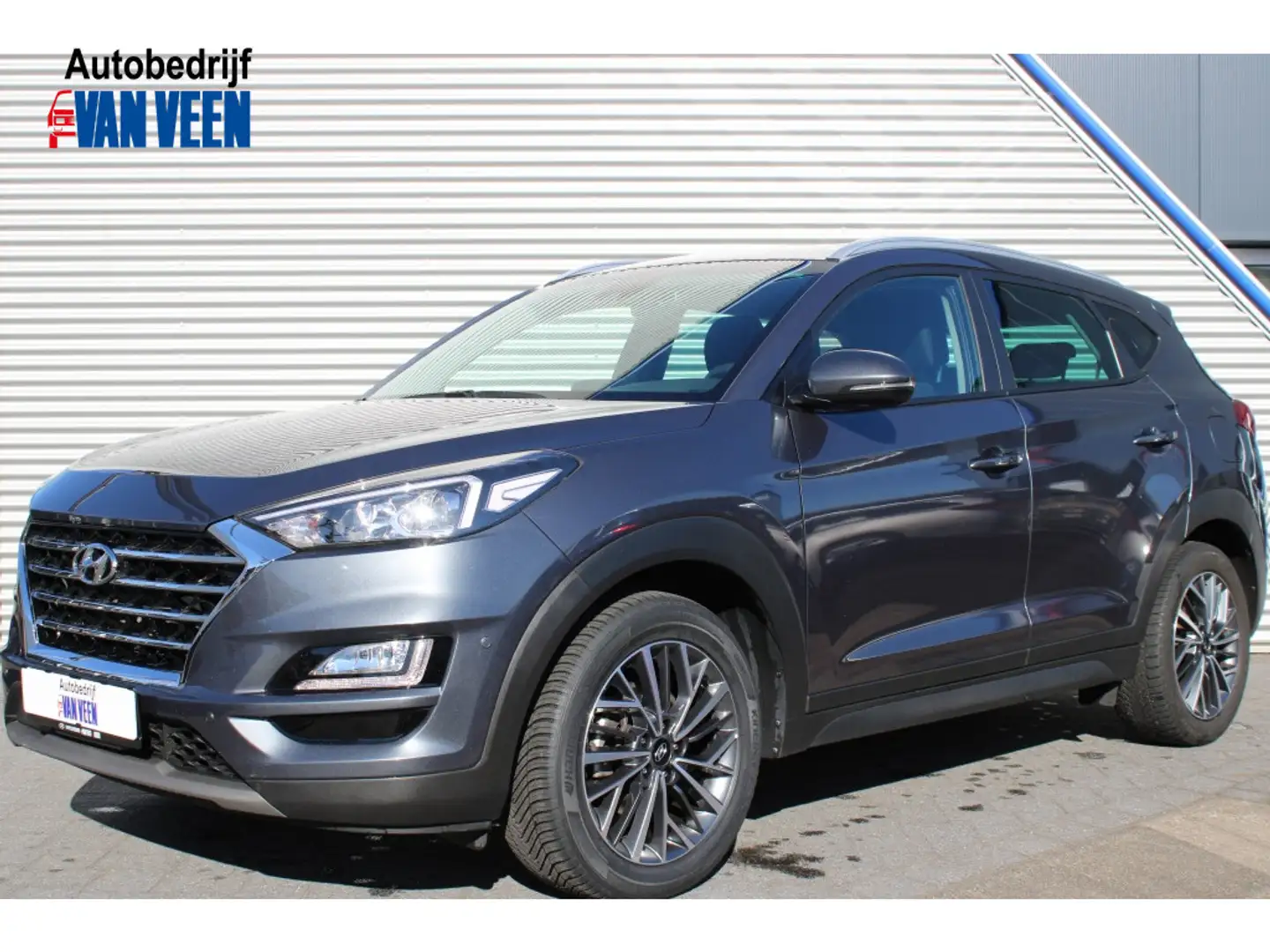 Hyundai TUCSON 1.6 T-GDI Comfort Automaat | Navi | Clima | Cruise Grau - 1