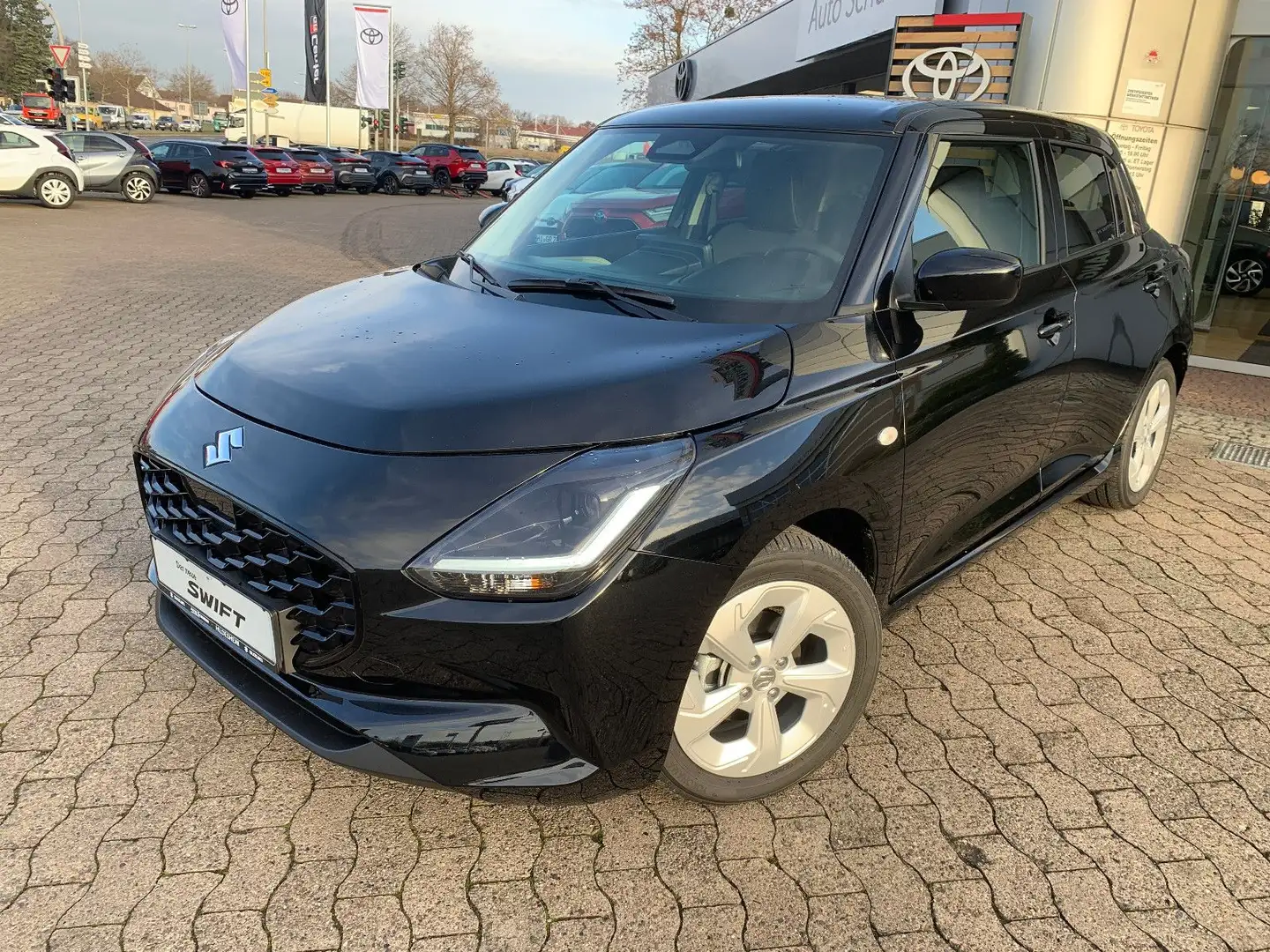 Suzuki Swift 1.2 Dualjet Hybrid CVT 61 kW Comfort Schwarz - 1