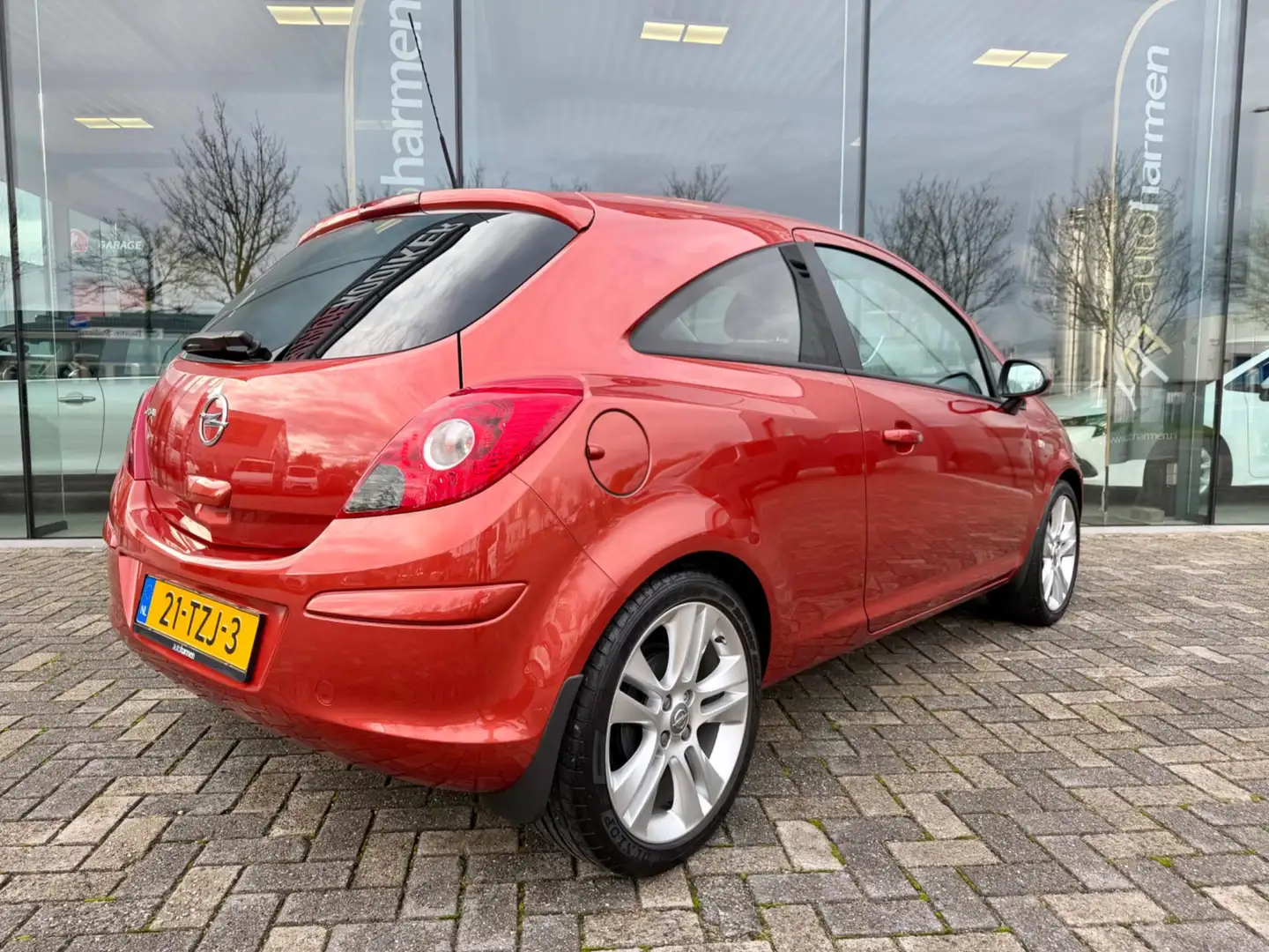 Opel Corsa 1.4-16V Edition 1e eigenaar, NAP, 37.652 km, Navi, Rood - 2