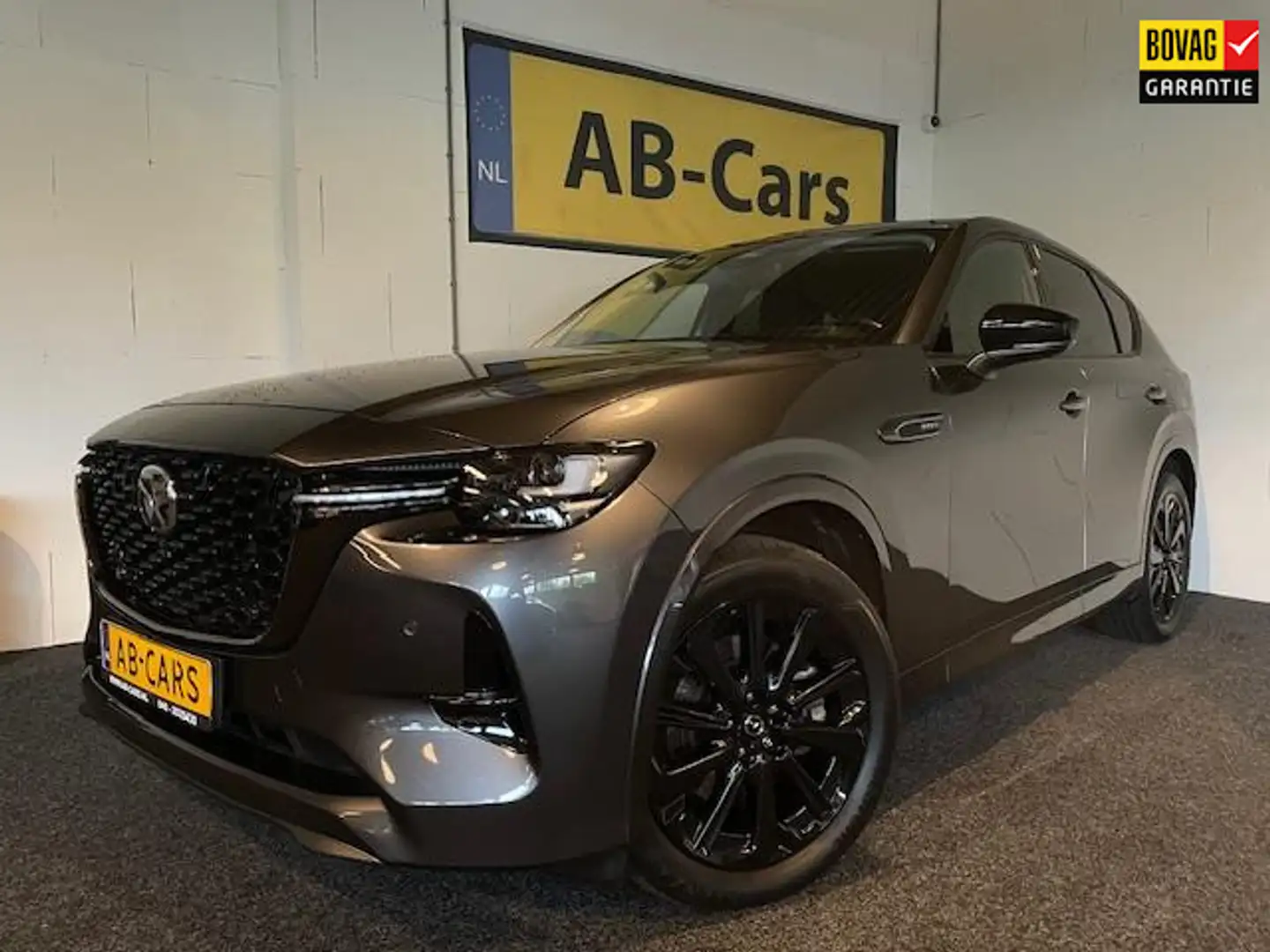 Mazda CX-60 2.5 e-SkyActiv PHEV Homura met Convenience en Driv Grijs - 1