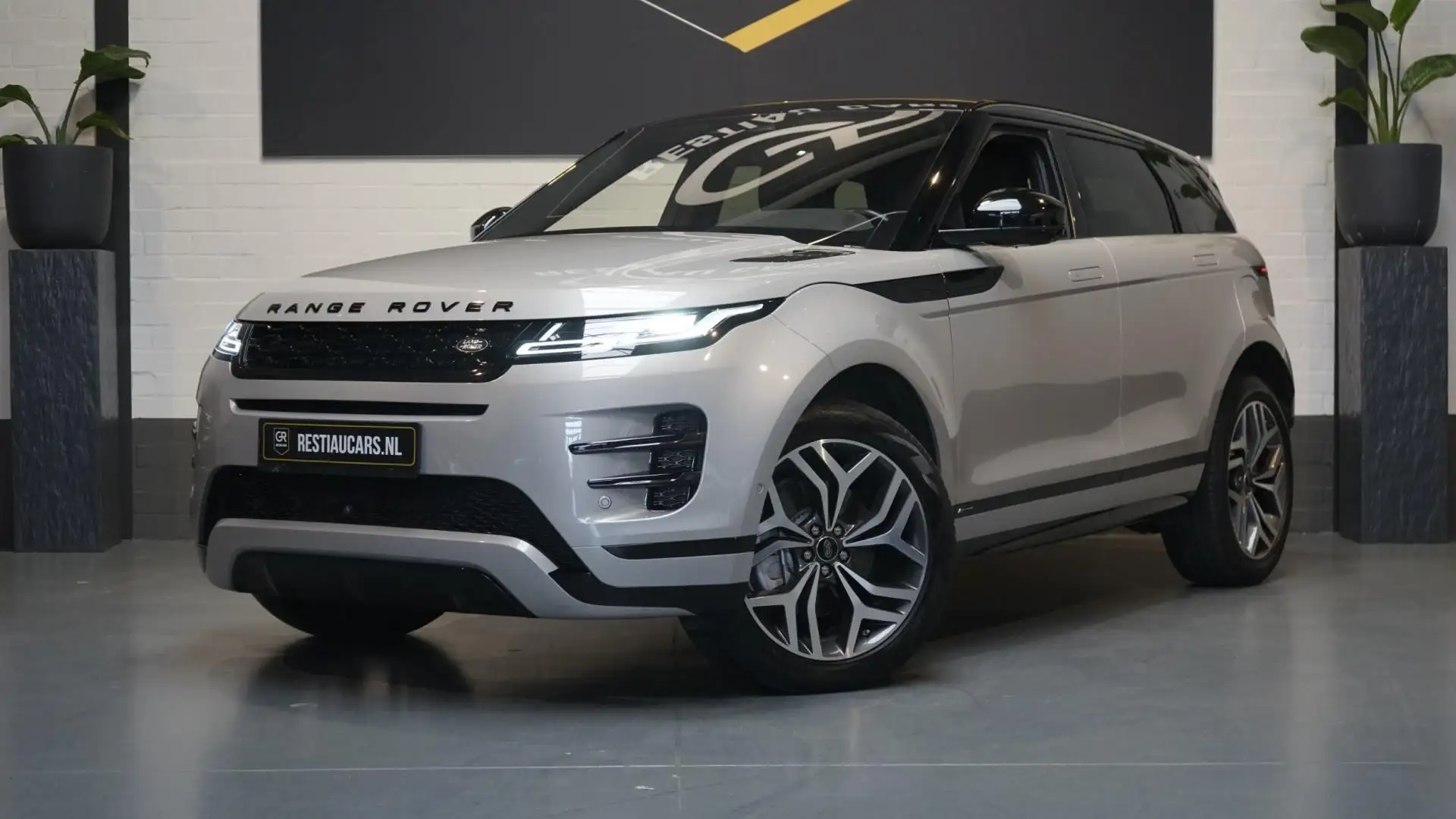 Land Rover Range Rover Evoque 1.5 P300e AWD R-Dynamic HSE AUTOMAAT-360 CAMERA-FU Grijs - 1