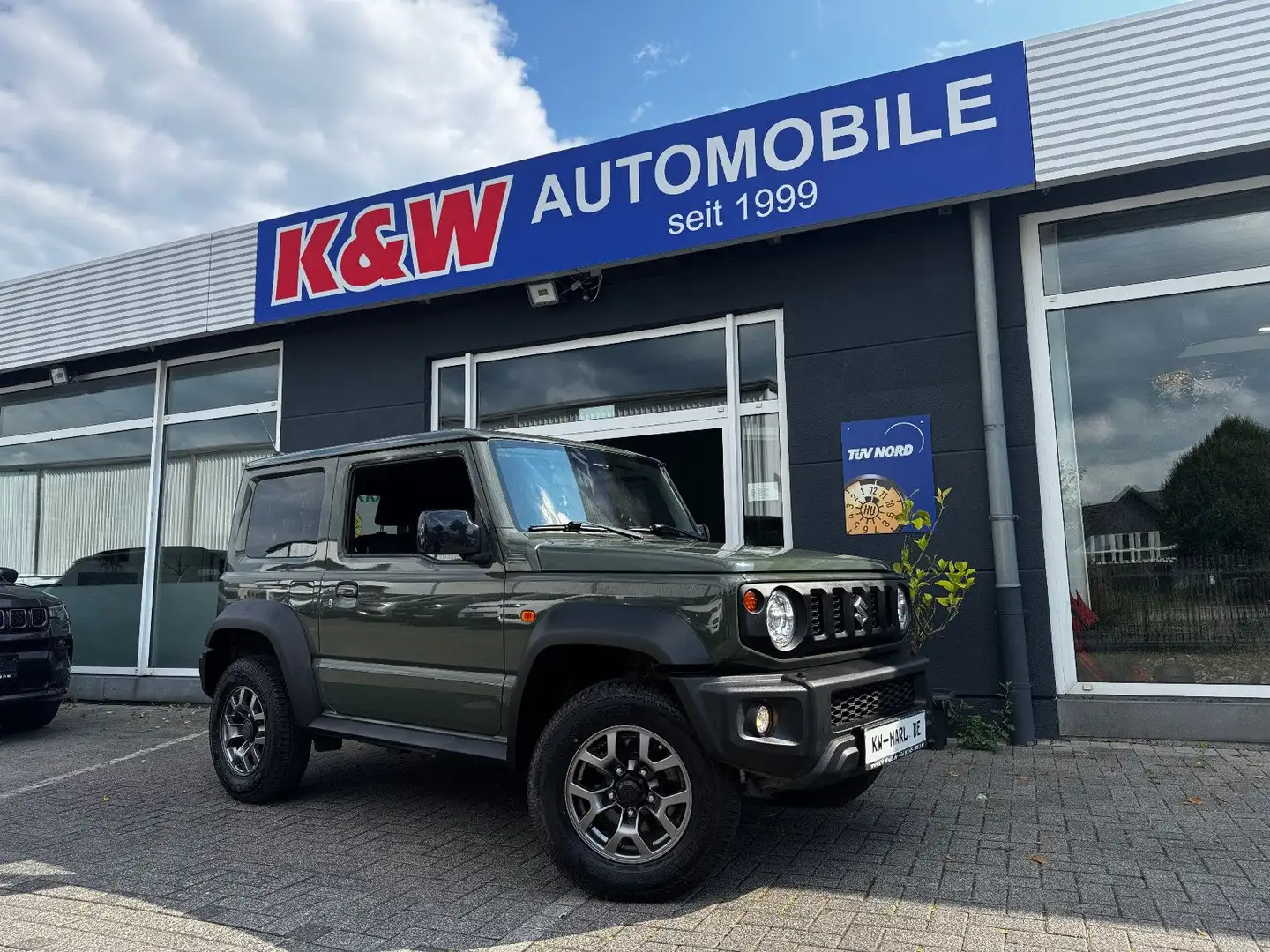 Suzuki Jimny Comfort+ AllGrip NAVI+CAM KLIMA ALLWETTER Verde - 1