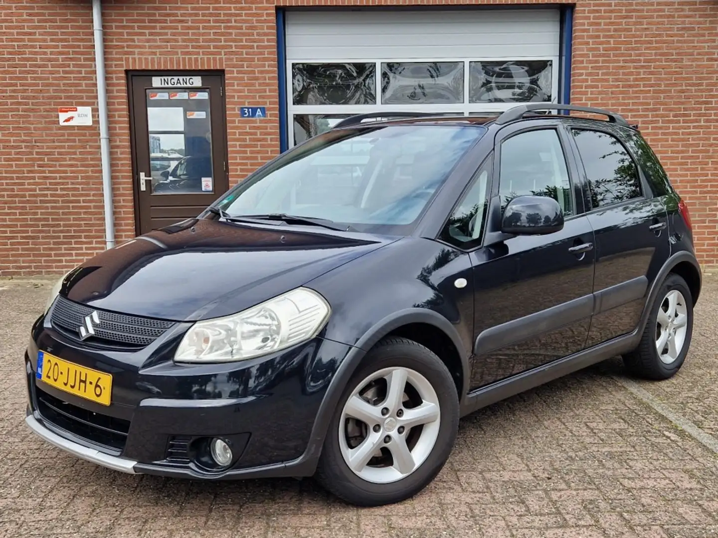 Suzuki SX4 1.6i Shogun 5-drs Airco NL-auto Trekhaak Negru - 1