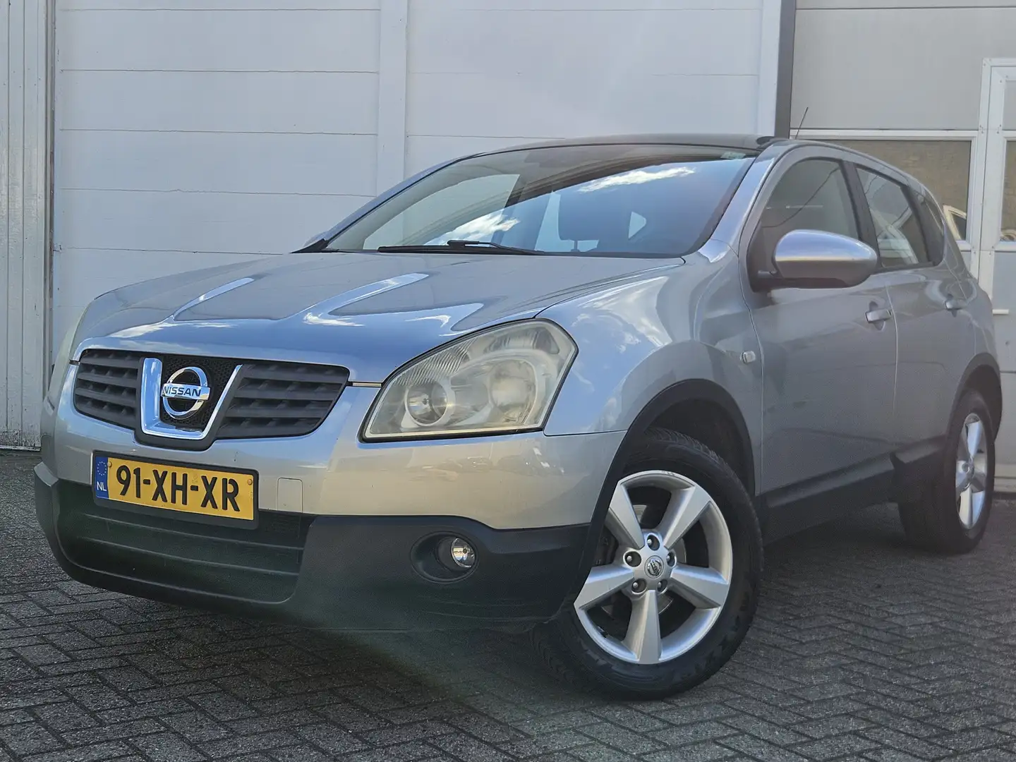 Nissan Qashqai 2.0 Tekna Pack /Pano/Cruise/PDC/Trekhaak! Grijs - 1