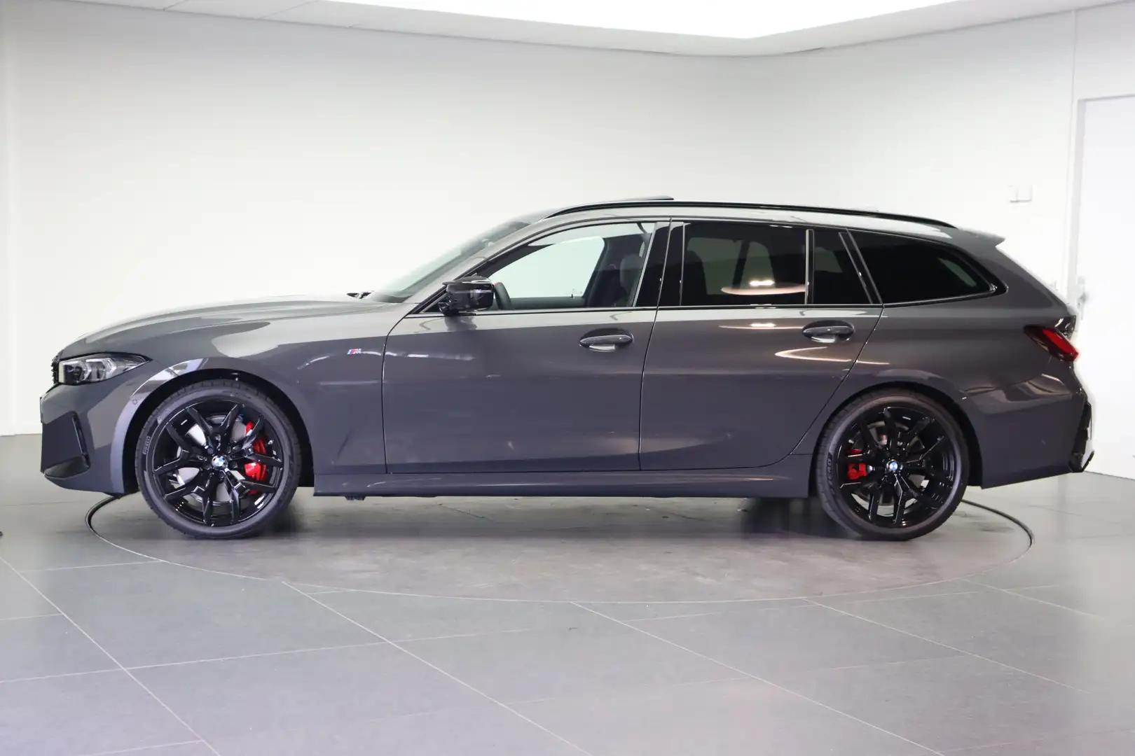 BMW 340 3 Serie Touring M340i xDrive Automaat / Panoramada Grau - 2