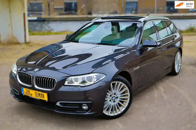 BMW 528 5-serie Touring 528i Luxury Edition NAP Pano Leer