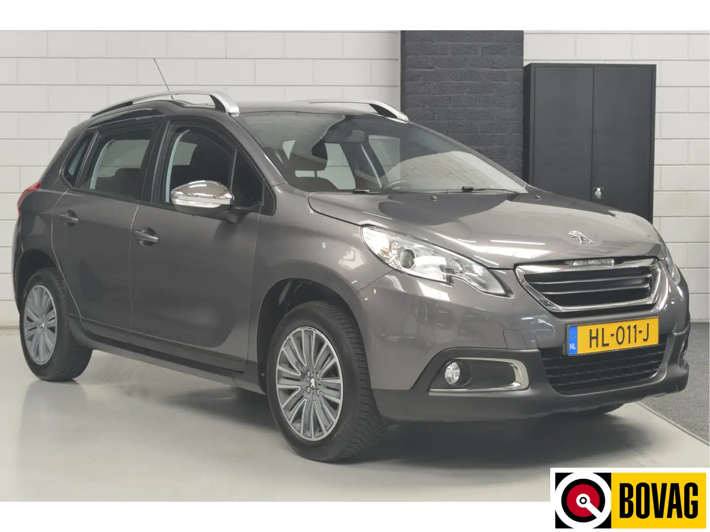 Peugeot 2008 1.2 PureTech Active // AIRCO // NAVI // CRUISE // Grijs - 1