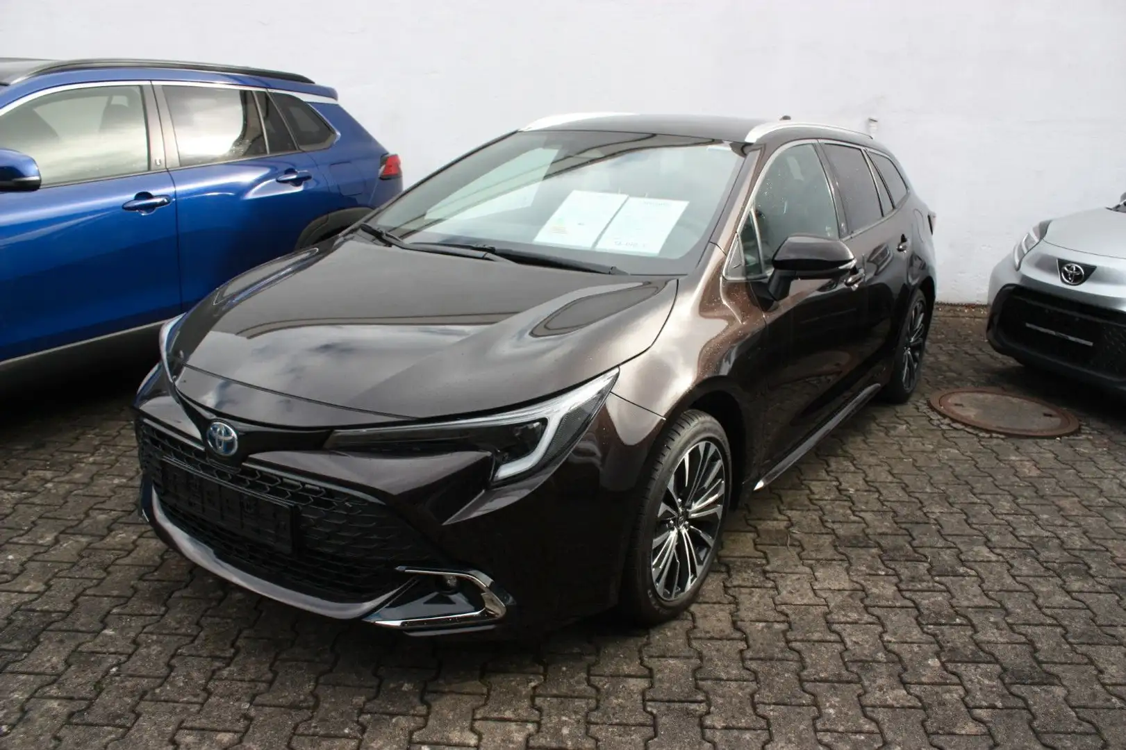 Toyota Corolla 2,0 Hybrid Team D Touring Sports Technik Brun - 1