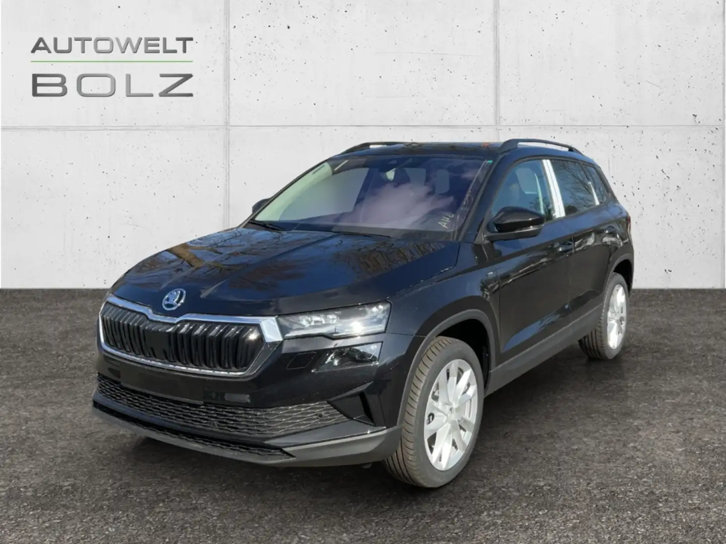 Skoda Karoq Tour 1.5 TSI AHK Navi DigiCock LED ACC El. Heckkla Schwarz - 1