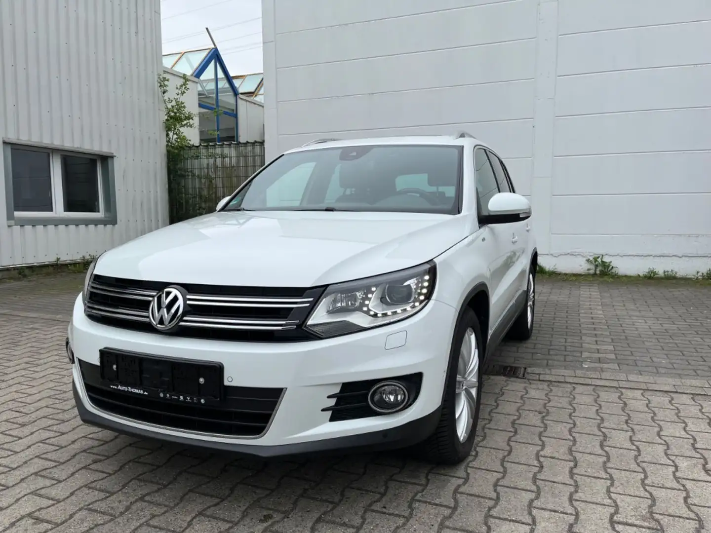 Volkswagen Tiguan Sport & Style BMT/PDC/Pano/2 Hand/Scheckh Blanc - 1