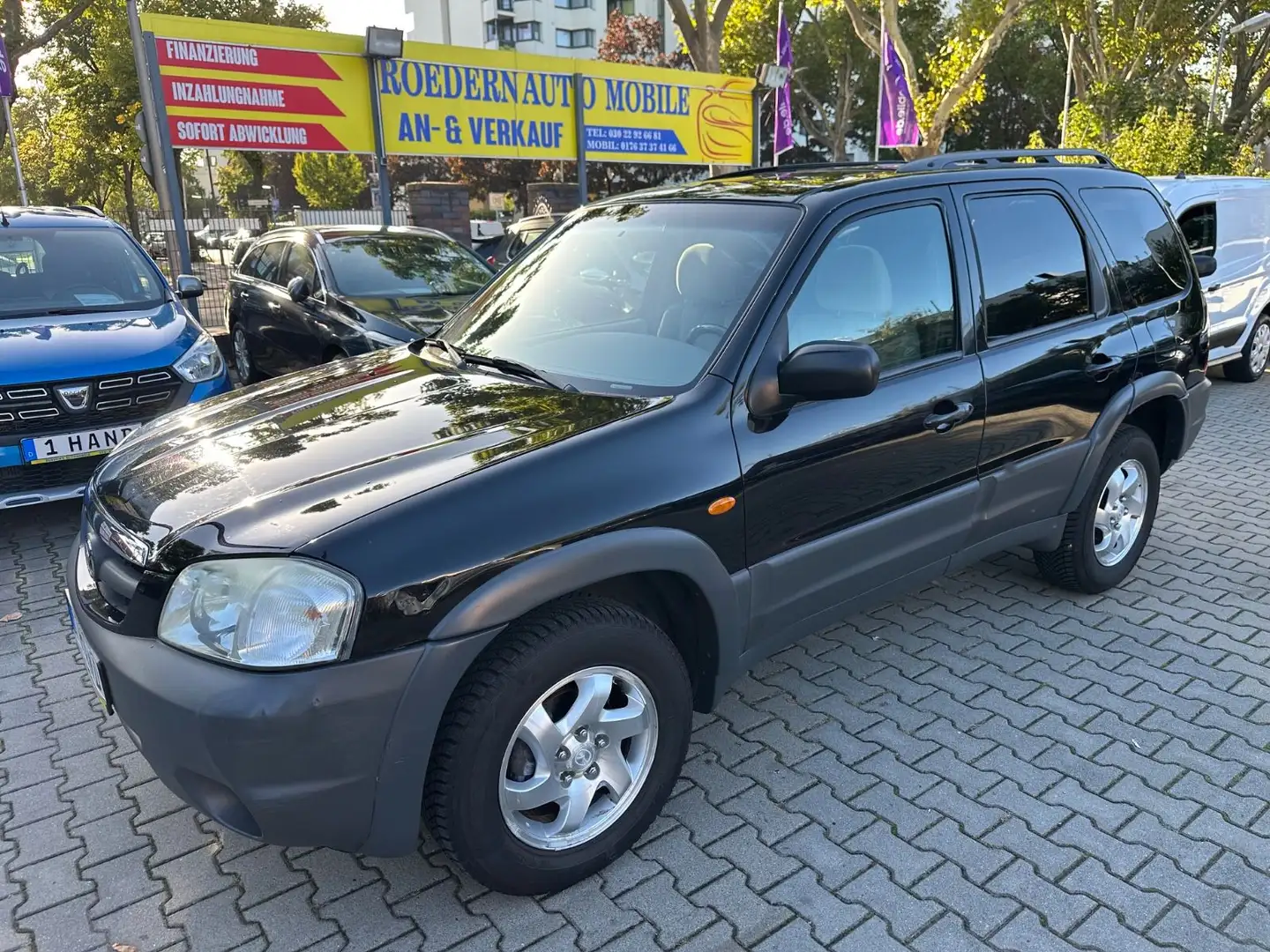 Mazda Tribute 2.0 Comfort 4x4 Schwarz - 1