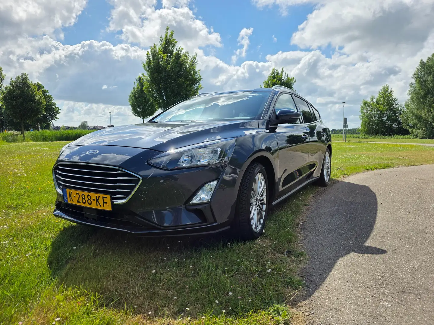 Ford Focus Focus 1.0 EBH Tit. XBns Blauw - 1