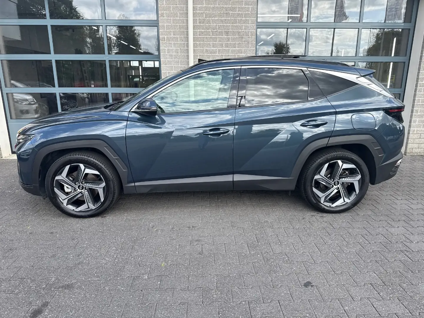 Hyundai TUCSON 1.6 T-GDI PHEV Comfort 4WD | SCHUIFDAK | CAMERA | Blauw - 2