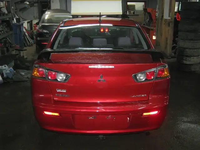 Mitsubishi Lancer 2013 — photo 7