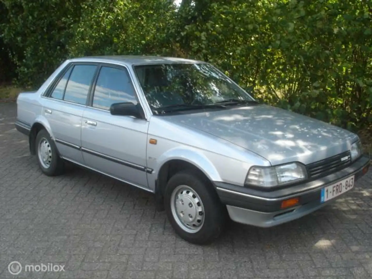 Mazda 323 1.5 GLX 4 drs. sedan Grau - 1
