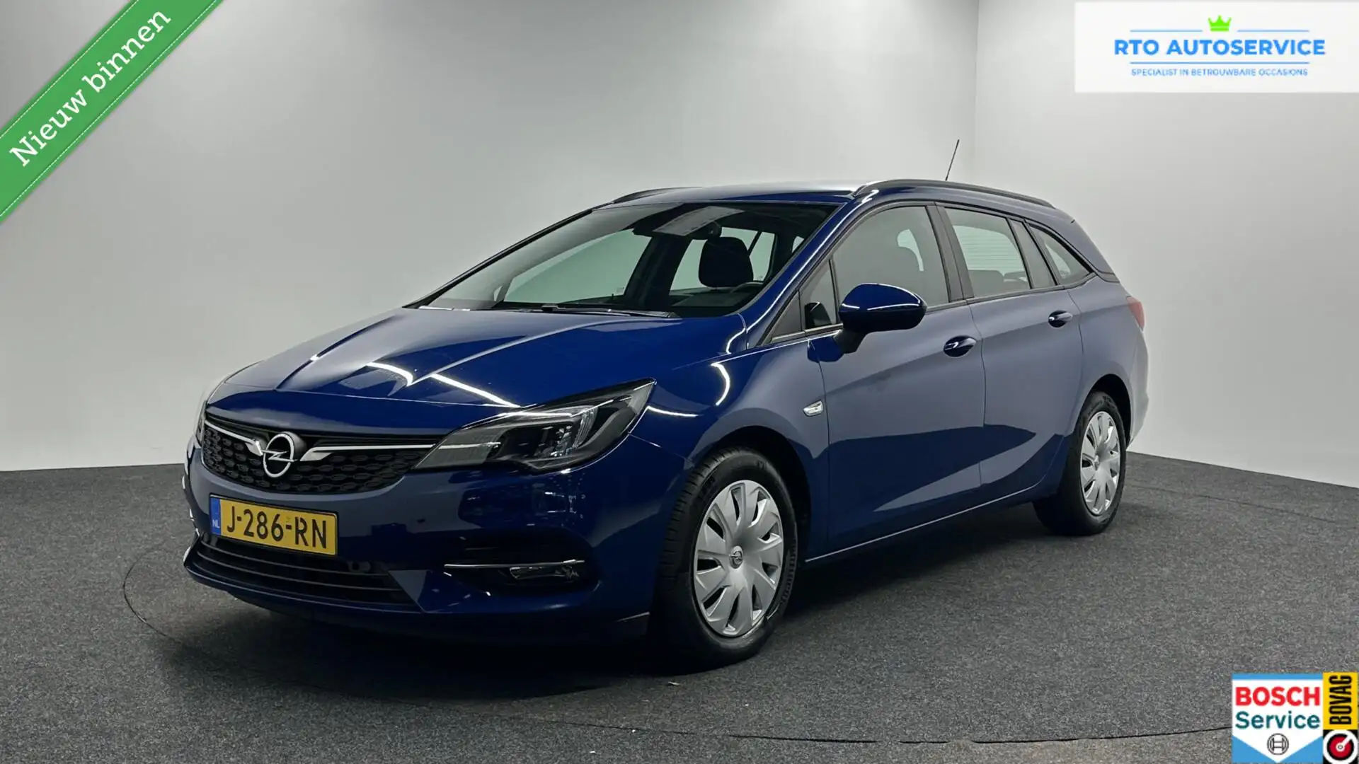 Opel Astra Sports Tourer 1.2 Business Executive 146 PK CAMERA Blauw - 1