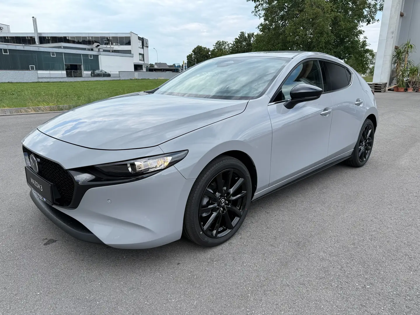 Mazda 3 e-Skyactiv G140 Homura Automatik 2,5L Grau - 1
