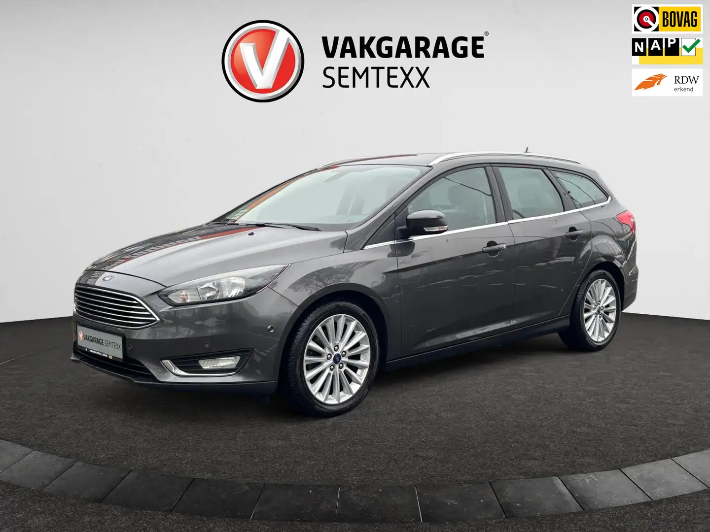 Ford Focus Wagon 1.5 Titanium | Org. NL | All-Season | Navi | Grau - 1