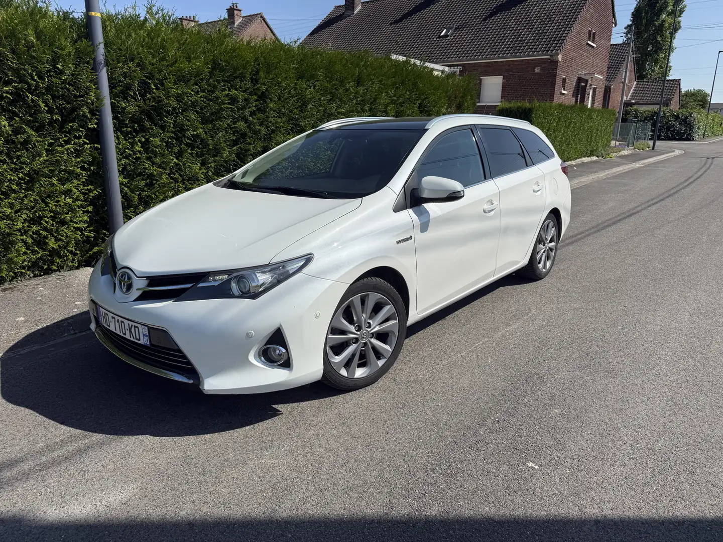 Toyota Auris Touring Sports Hybride 136h Feel! - 1