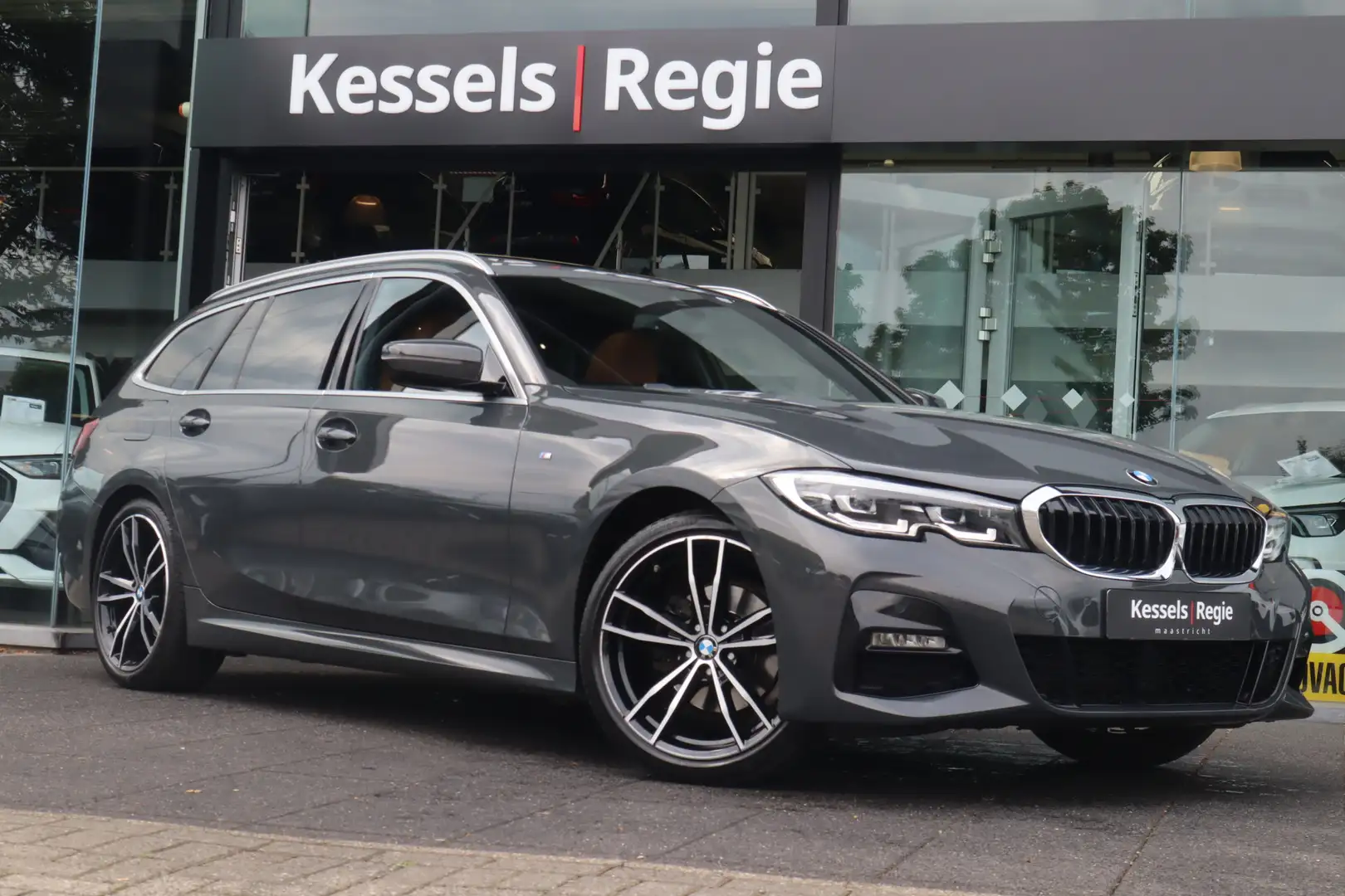 BMW 320 3-serie Touring 320i M-Sport Pano Ambient Dravit H Grijs - 1