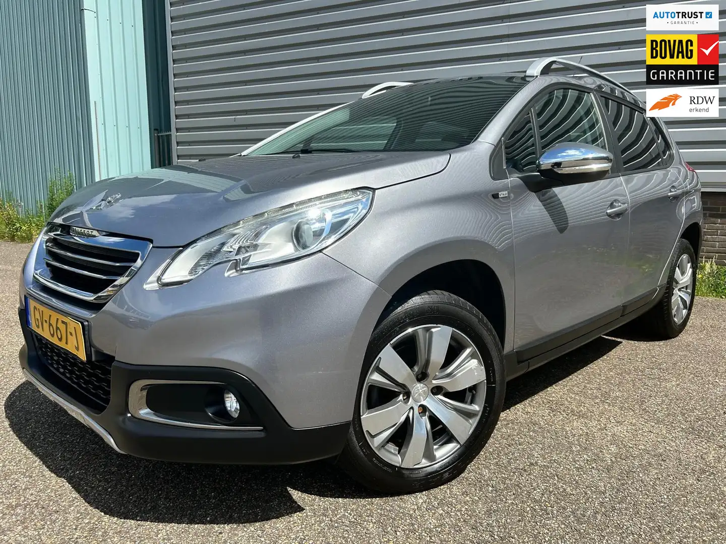 Peugeot 2008 1.2 PureTech Style Grijs - 1